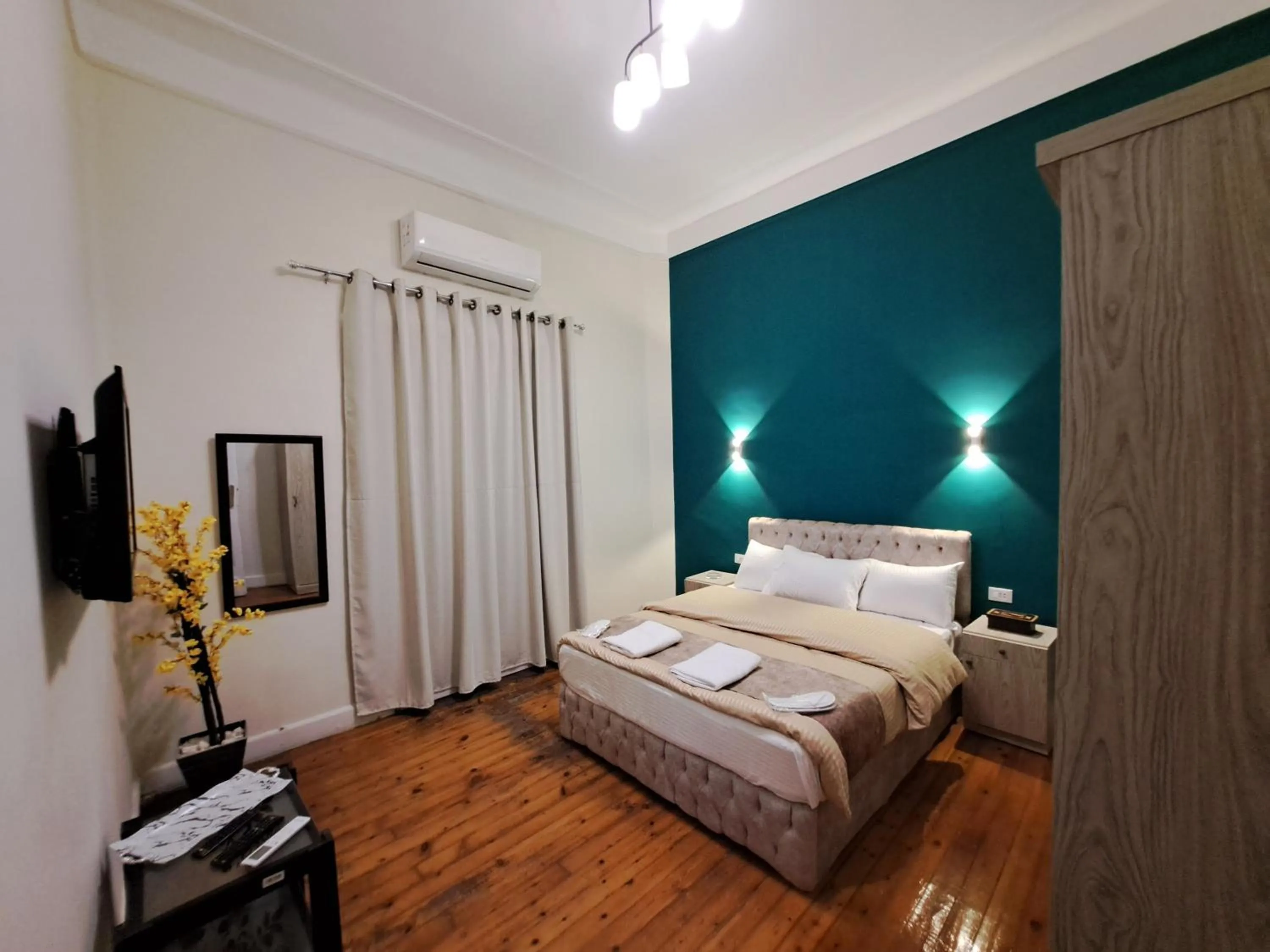 Bedroom, Bed in downtown Family Suites