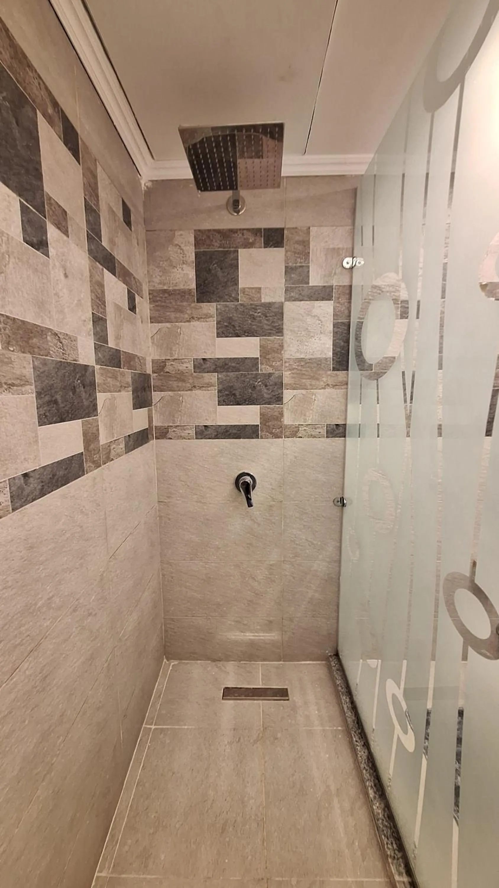 Shower in downtown Family Suites