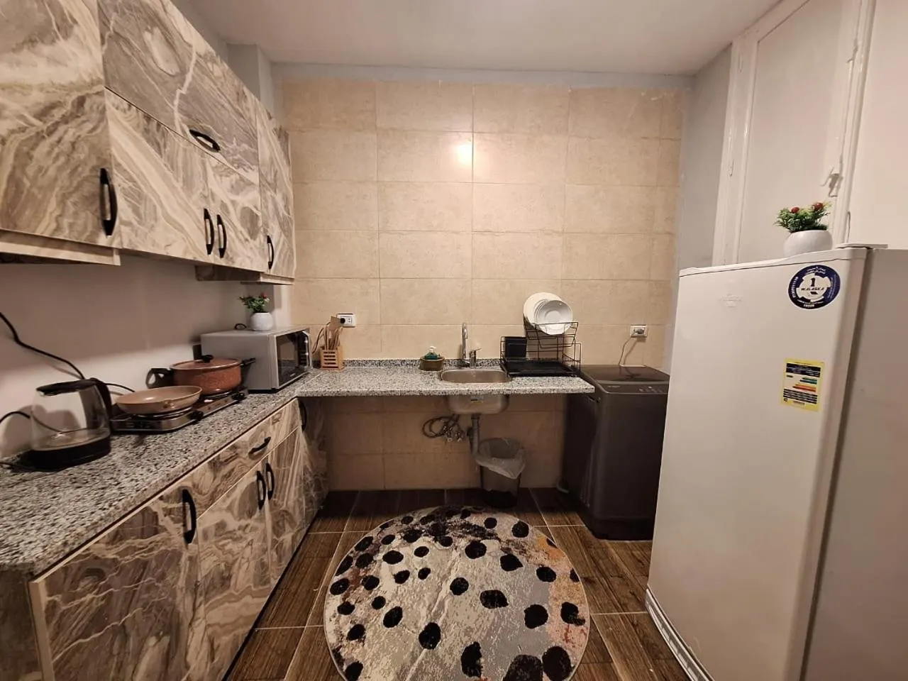 Kitchen or kitchenette in downtown Family Suites