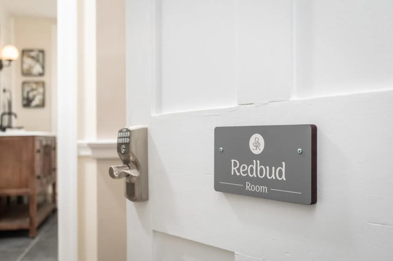 Logo/Certificate/Sign in By the Side of the Road Inn & Cottages