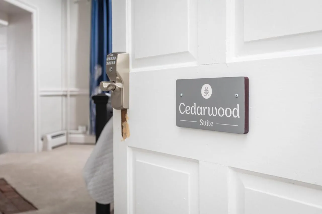 Logo/Certificate/Sign in By the Side of the Road Inn & Cottages