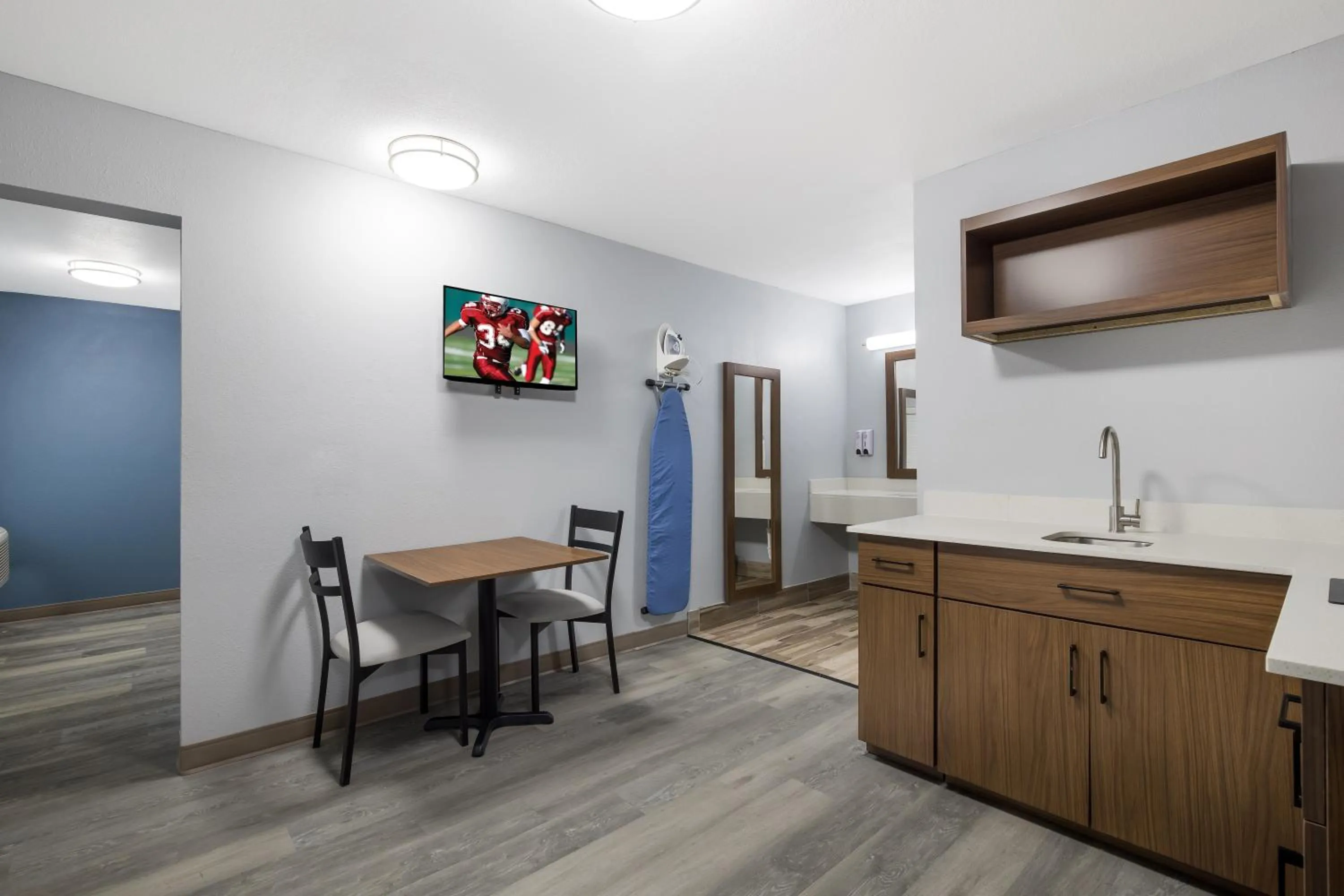 Kitchen or kitchenette in HomeTowne Studios by Red Roof Orange, TX