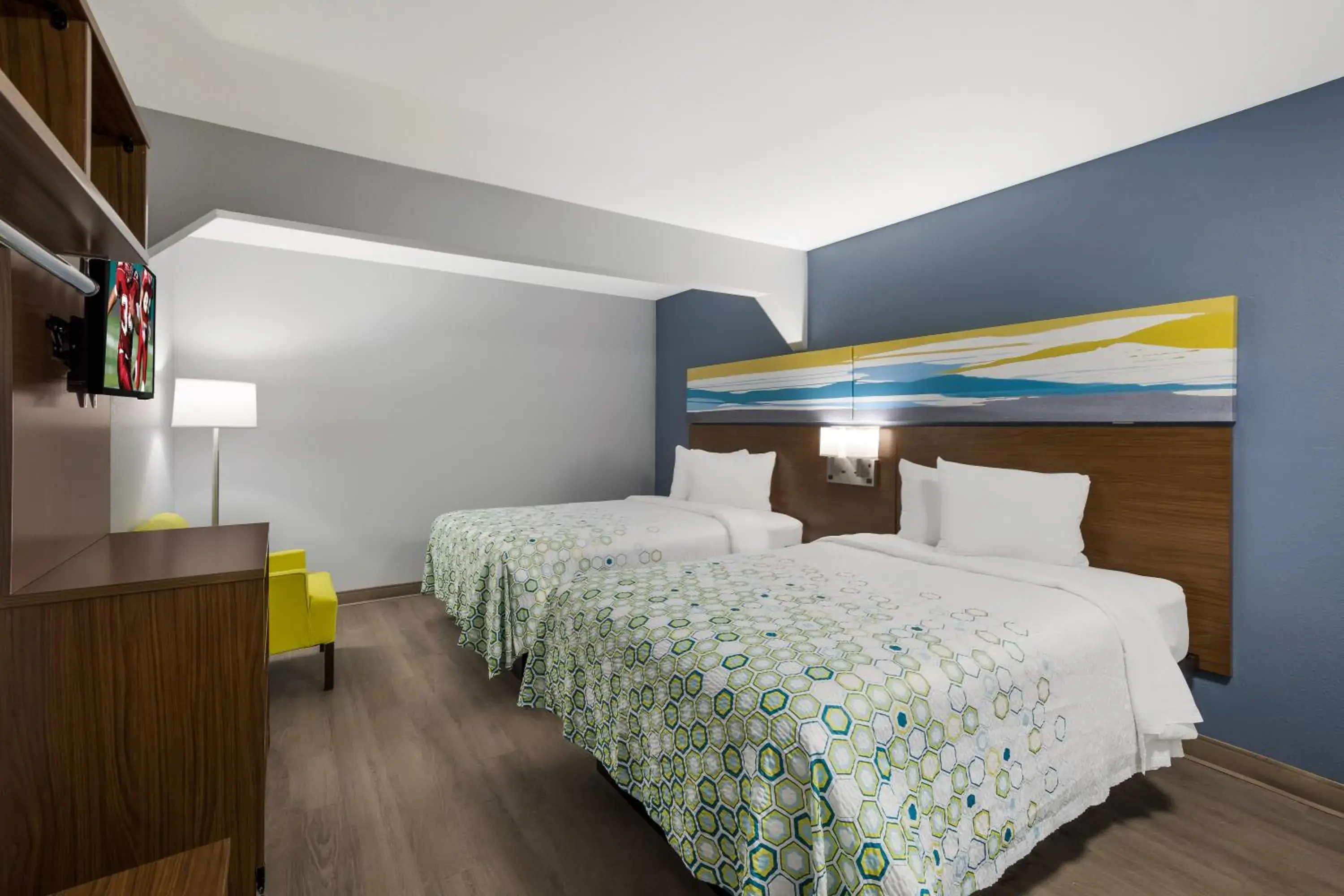 Bed in HomeTowne Studios by Red Roof Orange, TX Bed in HomeTowne Studios by Red Roof Orange, TX