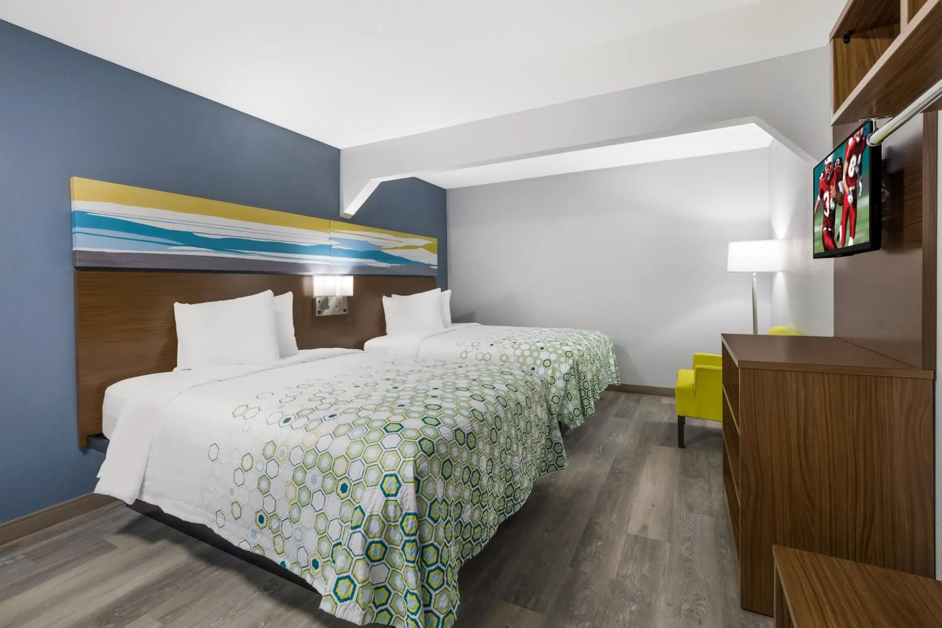 Bed in HomeTowne Studios by Red Roof Orange, TX Bed in HomeTowne Studios by Red Roof Orange, TX