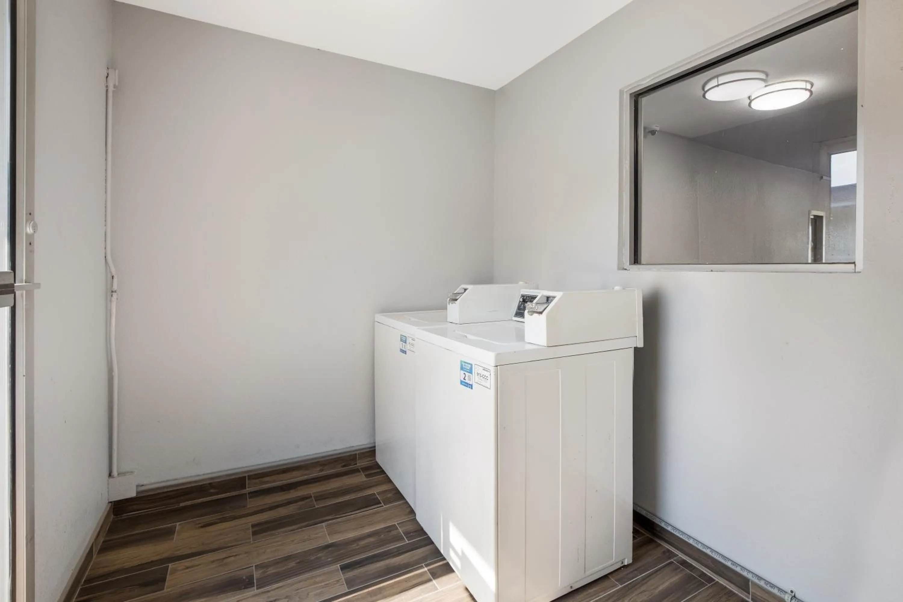 laundry in HomeTowne Studios by Red Roof Orange, TX