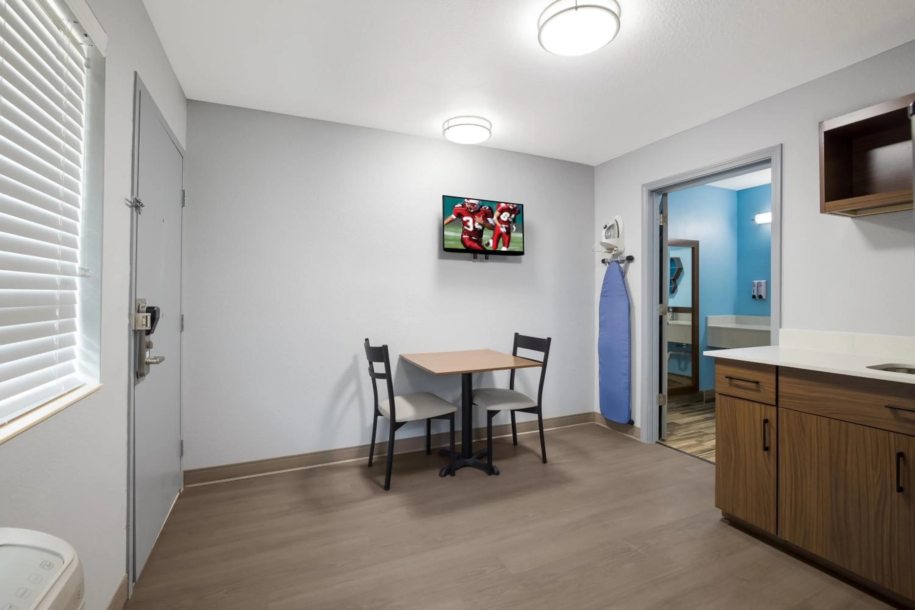 Dining area in HomeTowne Studios by Red Roof Orange, TX