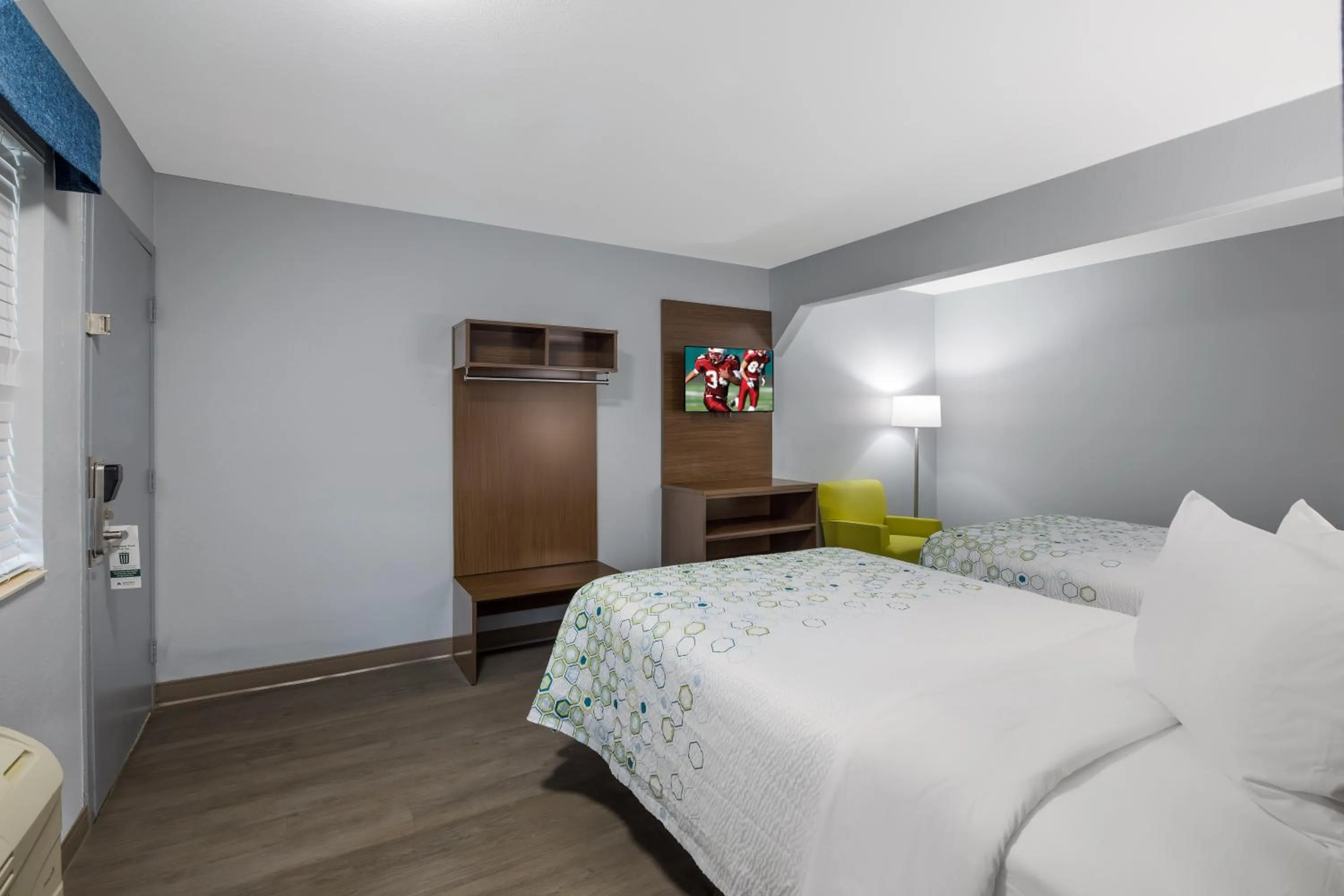 Bedroom, Bed in HomeTowne Studios by Red Roof Orange, TX