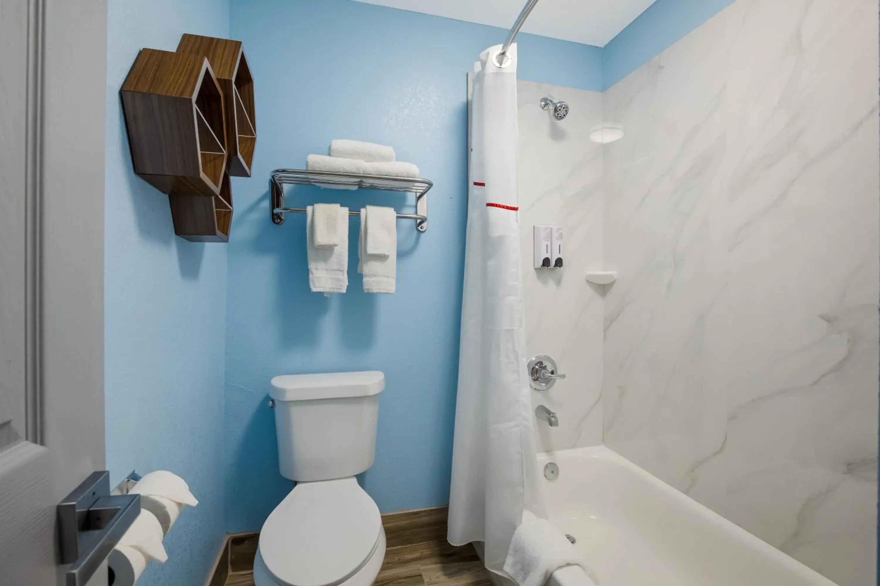 Bathroom in HomeTowne Studios by Red Roof Orange, TX Bathroom in HomeTowne Studios by Red Roof Orange, TX