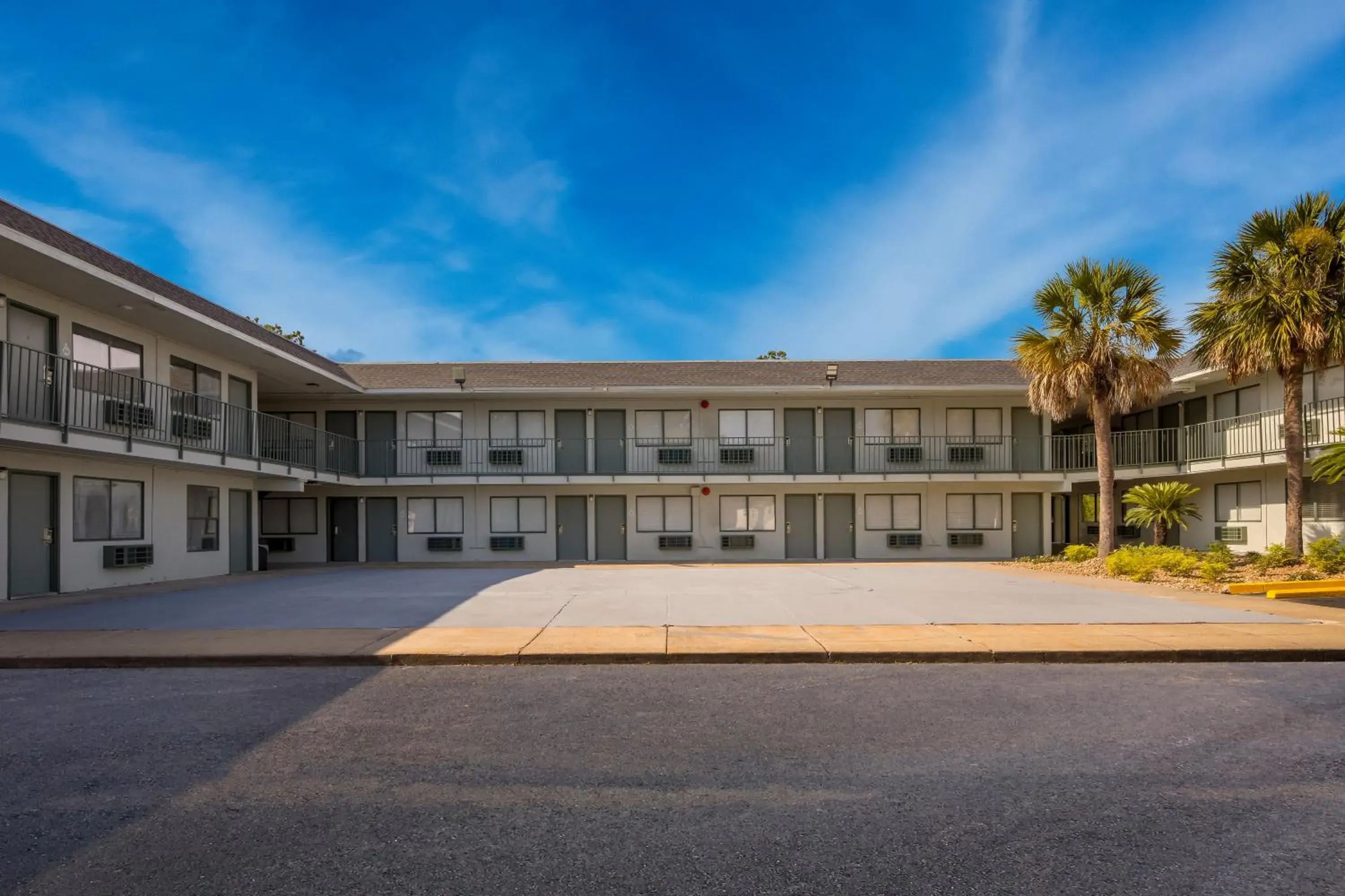 Property building in HomeTowne Studios by Red Roof Orange, TX Property building in HomeTowne Studios by Red Roof Orange, TX