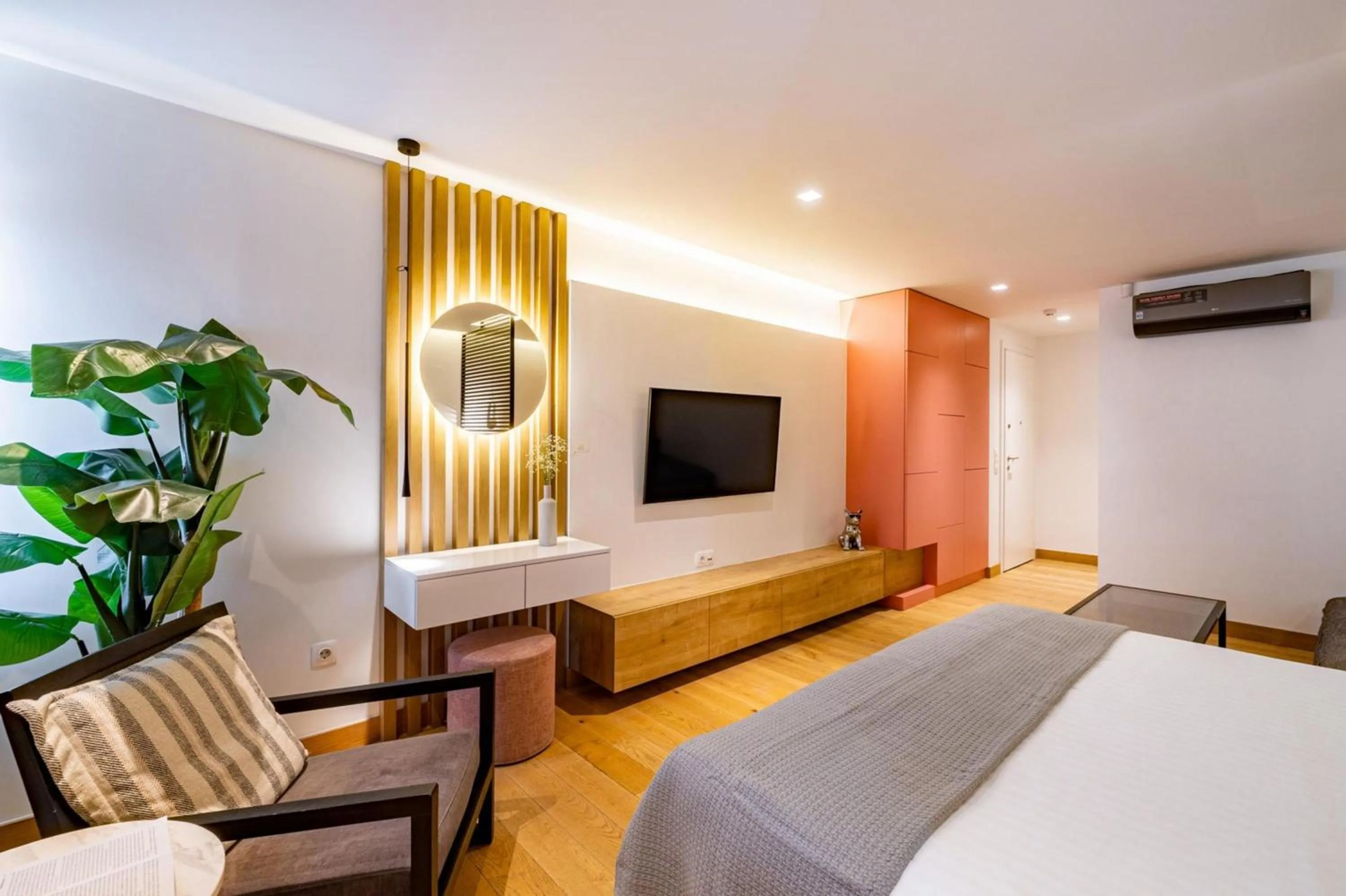 Bed in Earth Boutique Apartments next to Stavros Niarchos