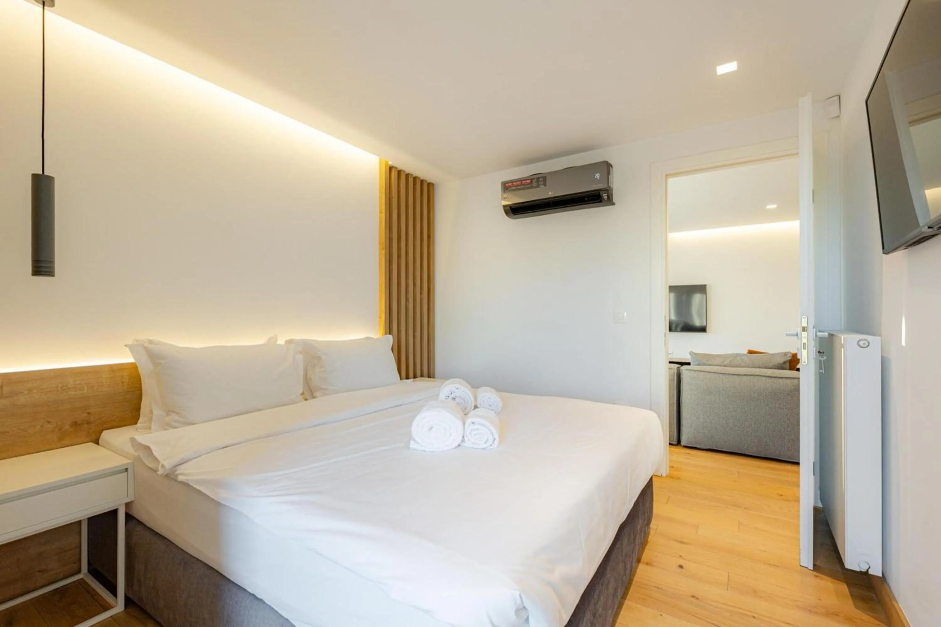 Bedroom, Bed in Earth Boutique Apartments next to Stavros Niarchos