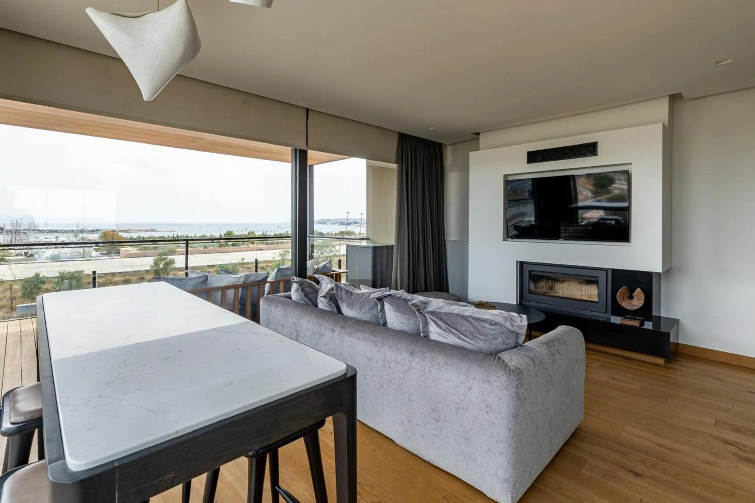 TV and multimedia in Earth Boutique Apartments next to Stavros Niarchos