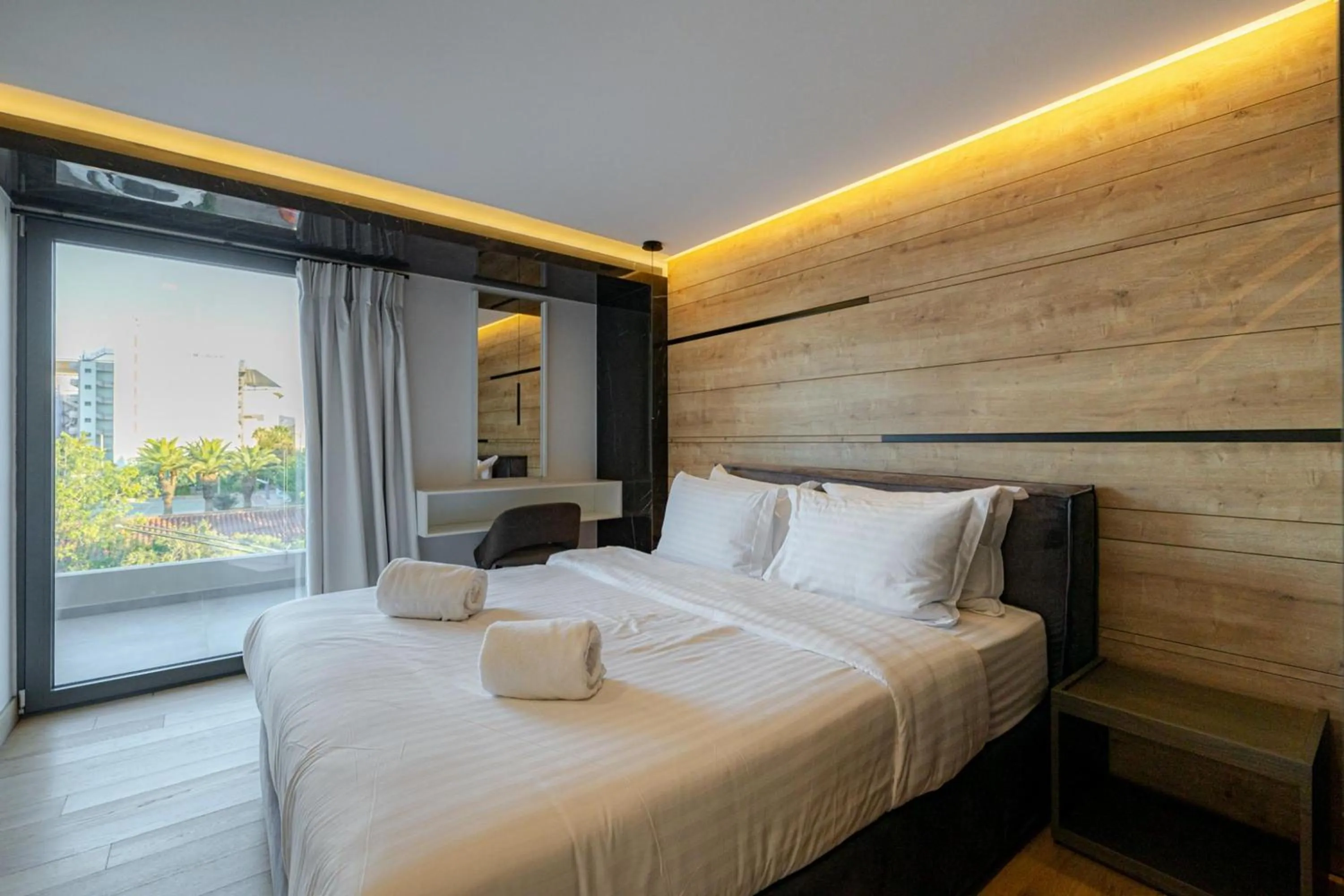 Bedroom, Bed in Earth Boutique Apartments next to Stavros Niarchos