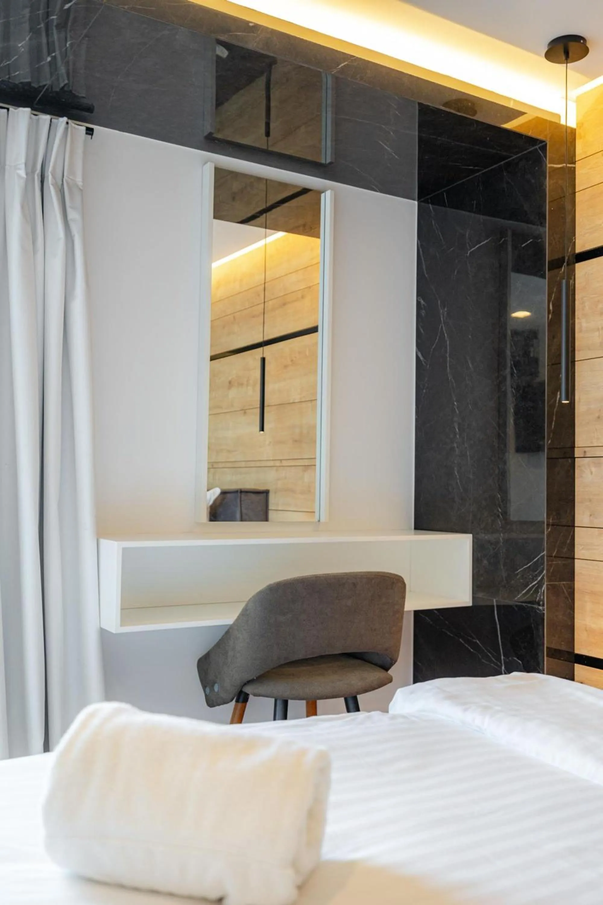 Bedroom, Bed in Earth Boutique Apartments next to Stavros Niarchos