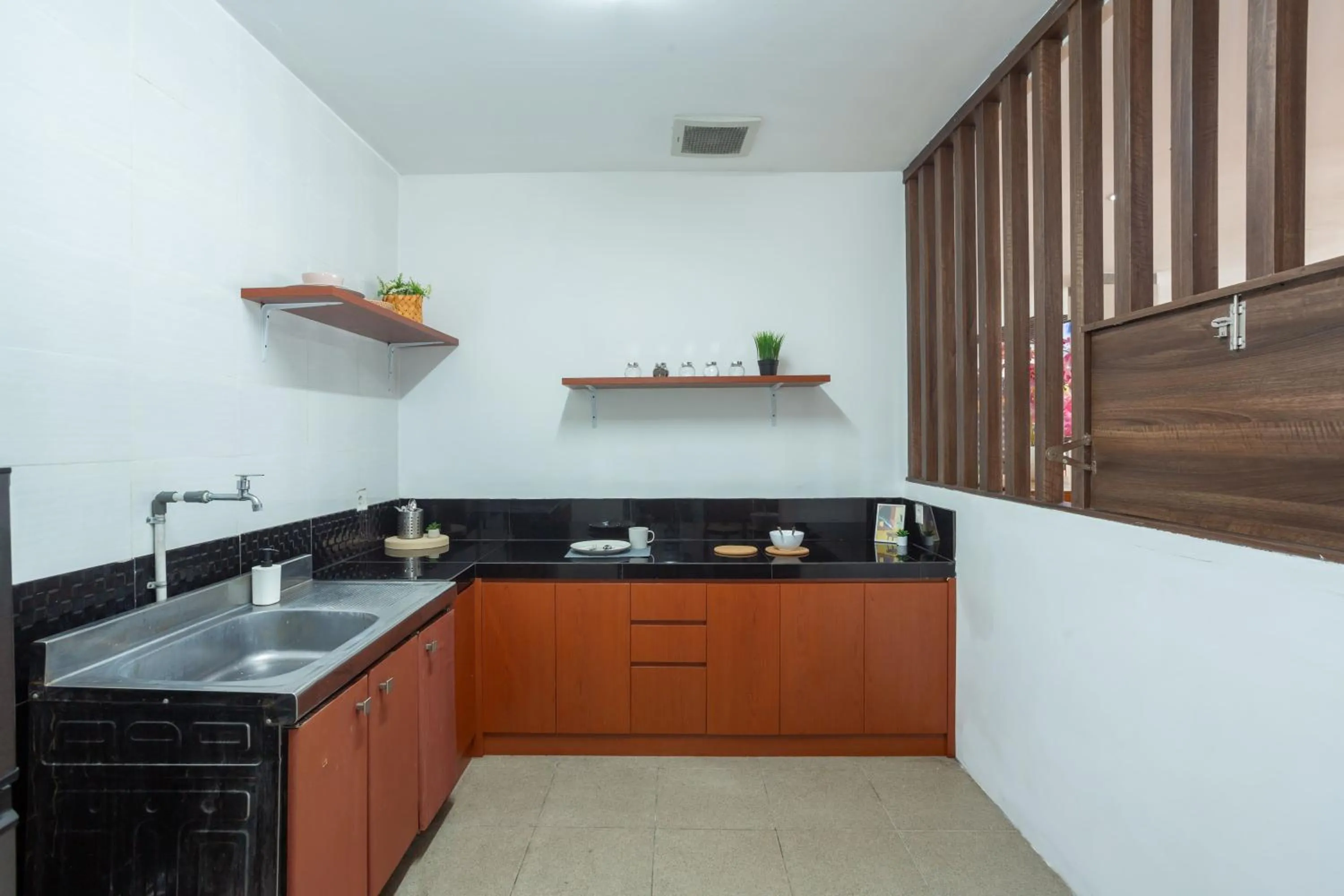 Kitchen or kitchenette in Cove De Tinaya