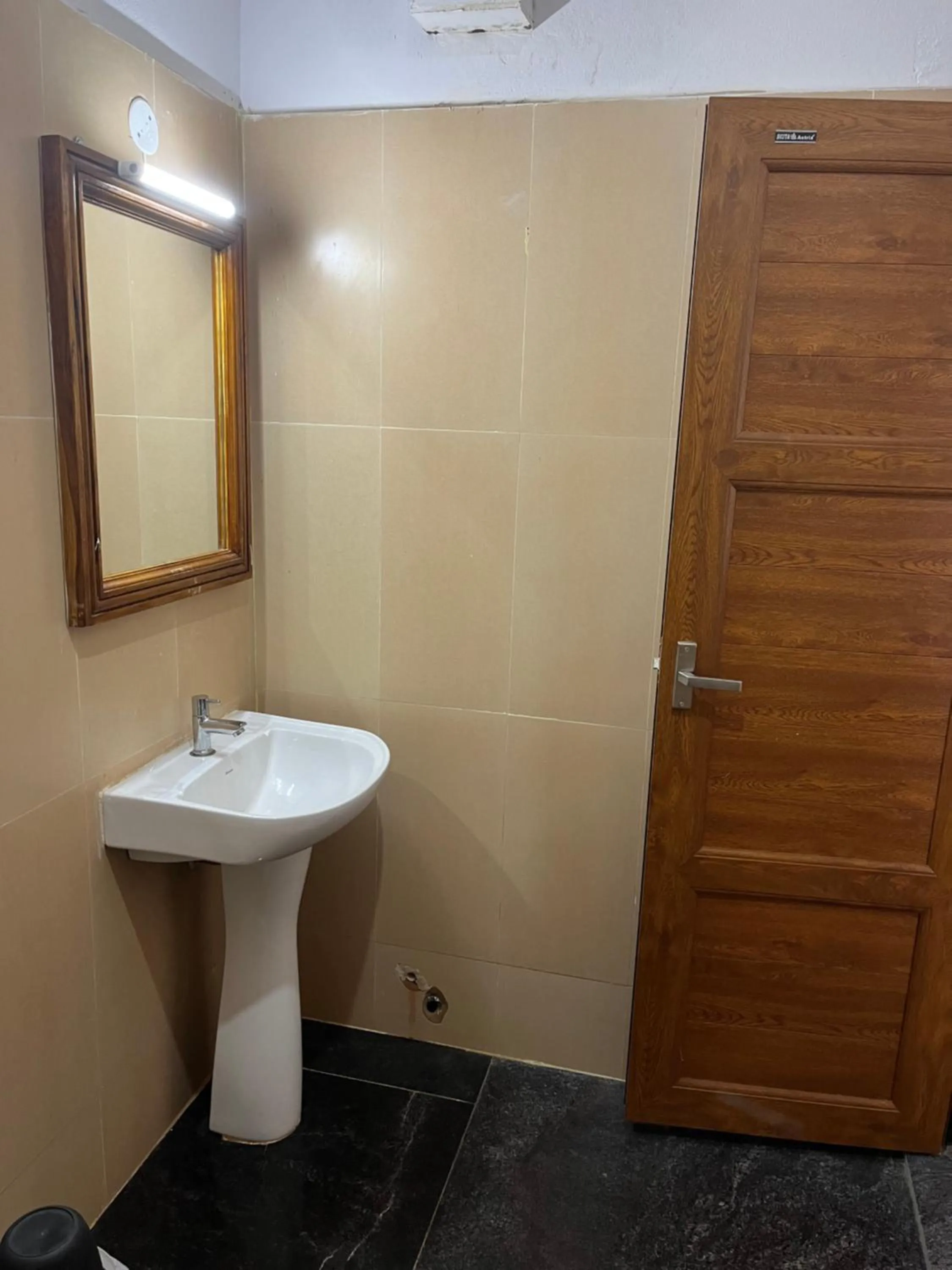 Bathroom in ANAND Beach Guesthouse by Moonrocks