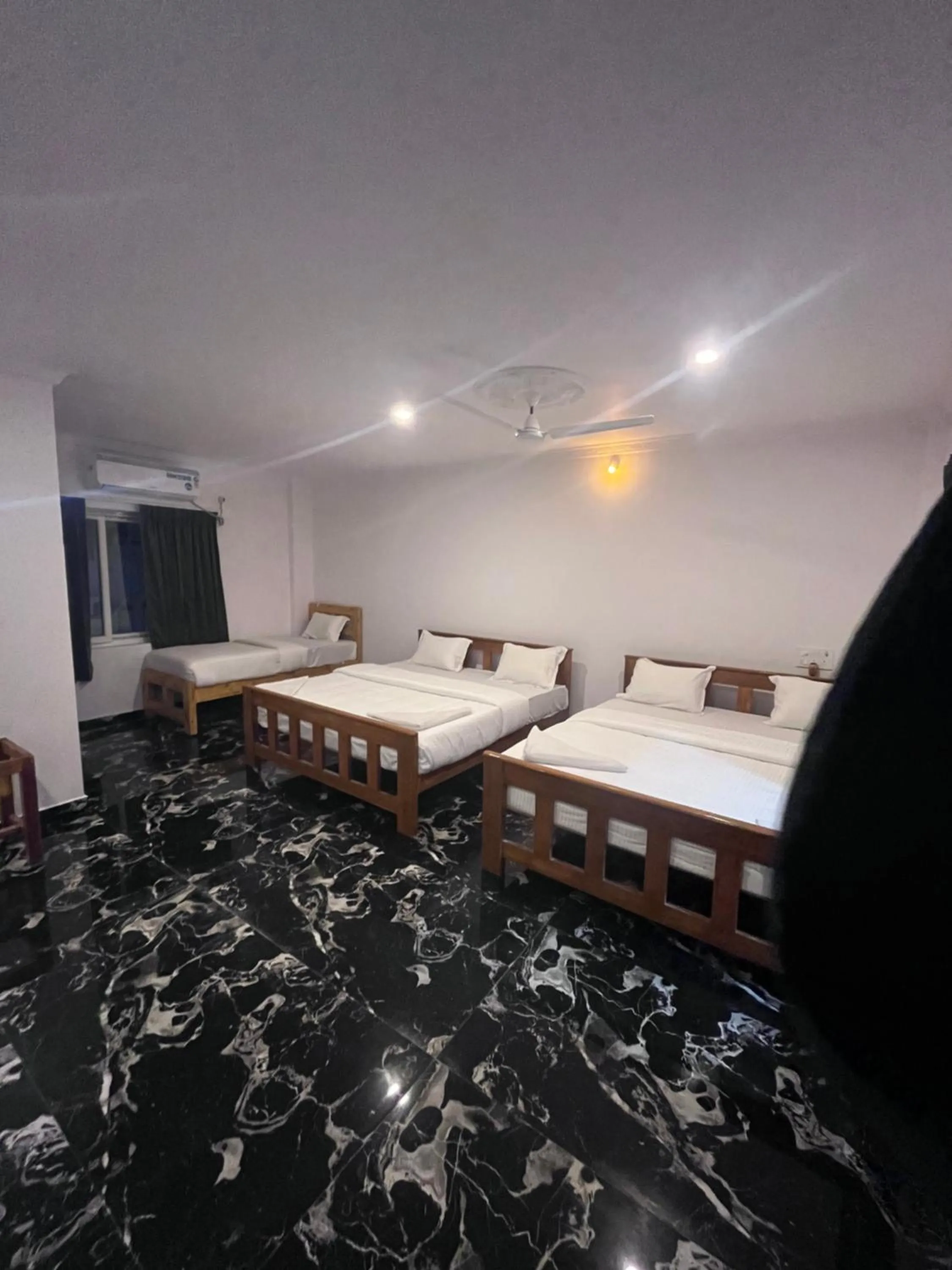 Bed in ANAND Beach Guesthouse by Moonrocks