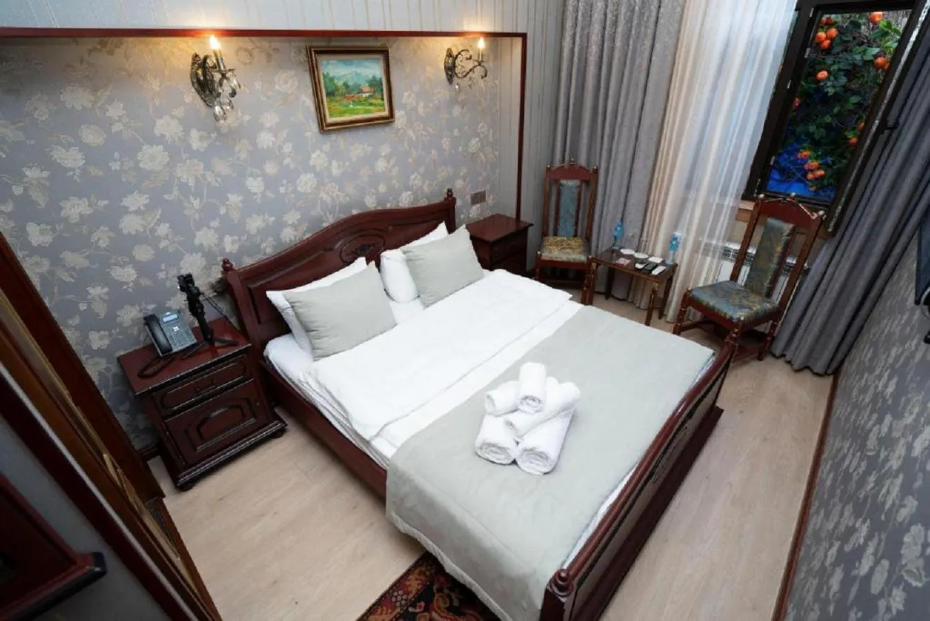 Bed in Royal Antique Boutique Hotel