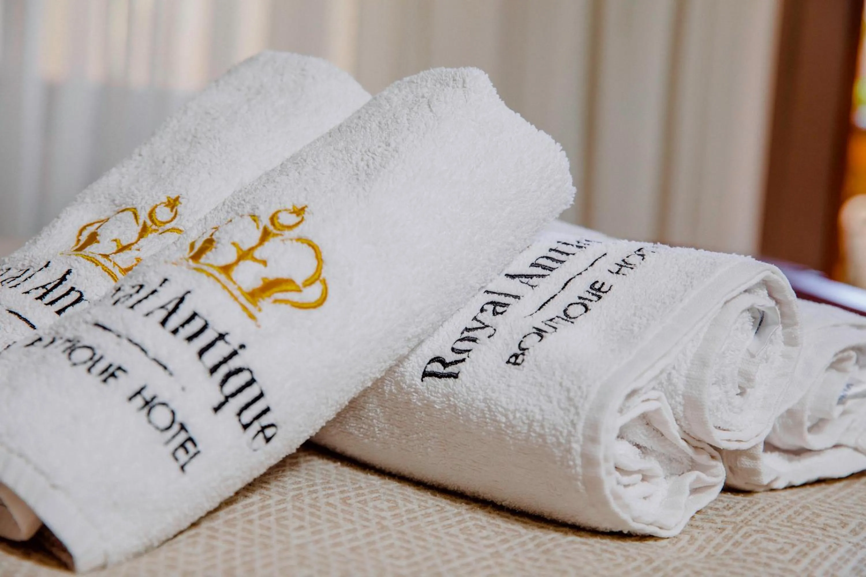 Bed in Royal Antique Boutique Hotel