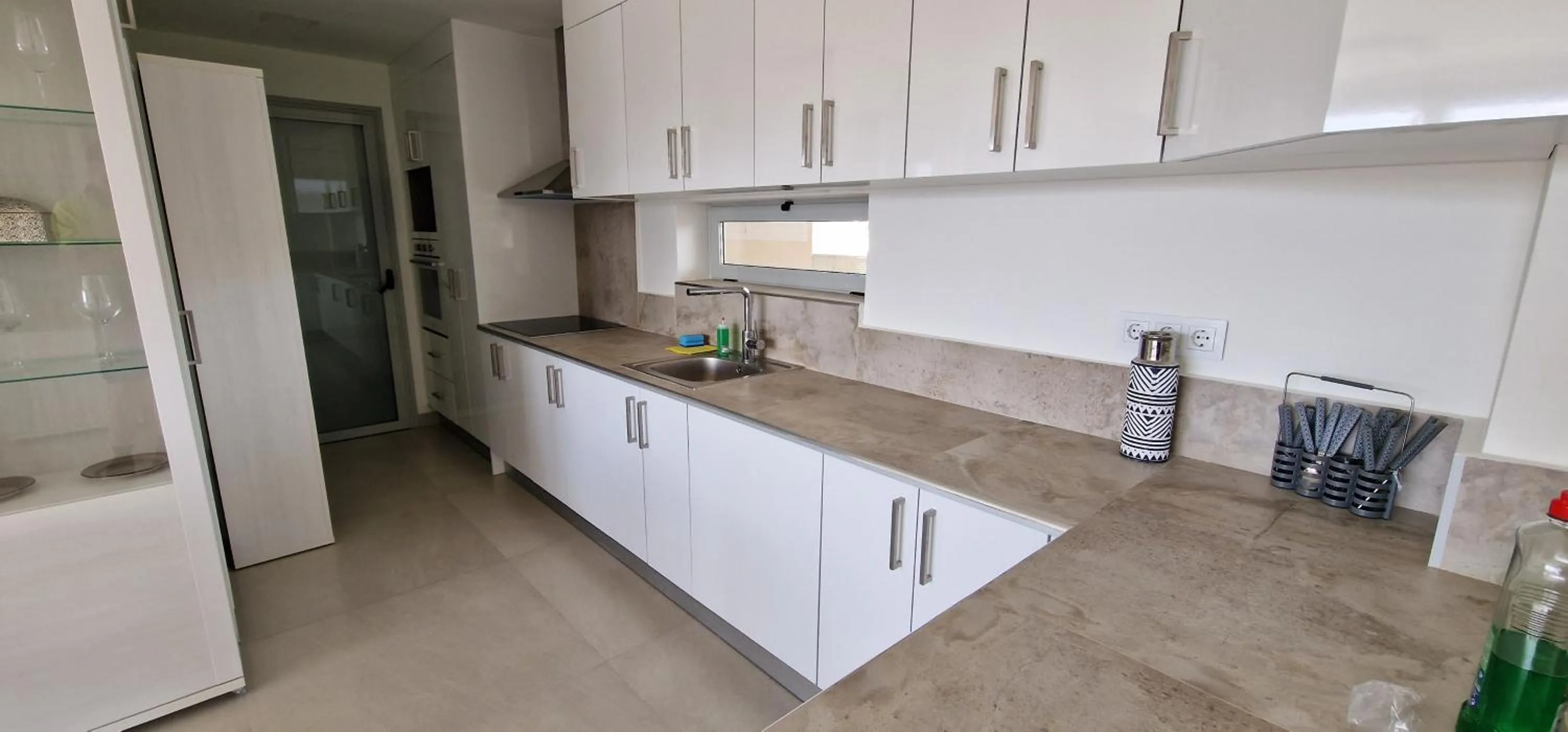 Kitchen or kitchenette in APARTAMENTOS OASIS DE LA CALA