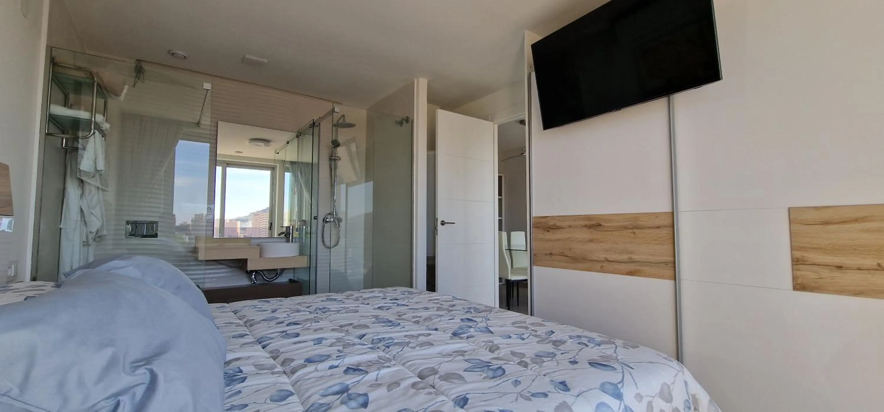 Bed in APARTAMENTOS OASIS DE LA CALA