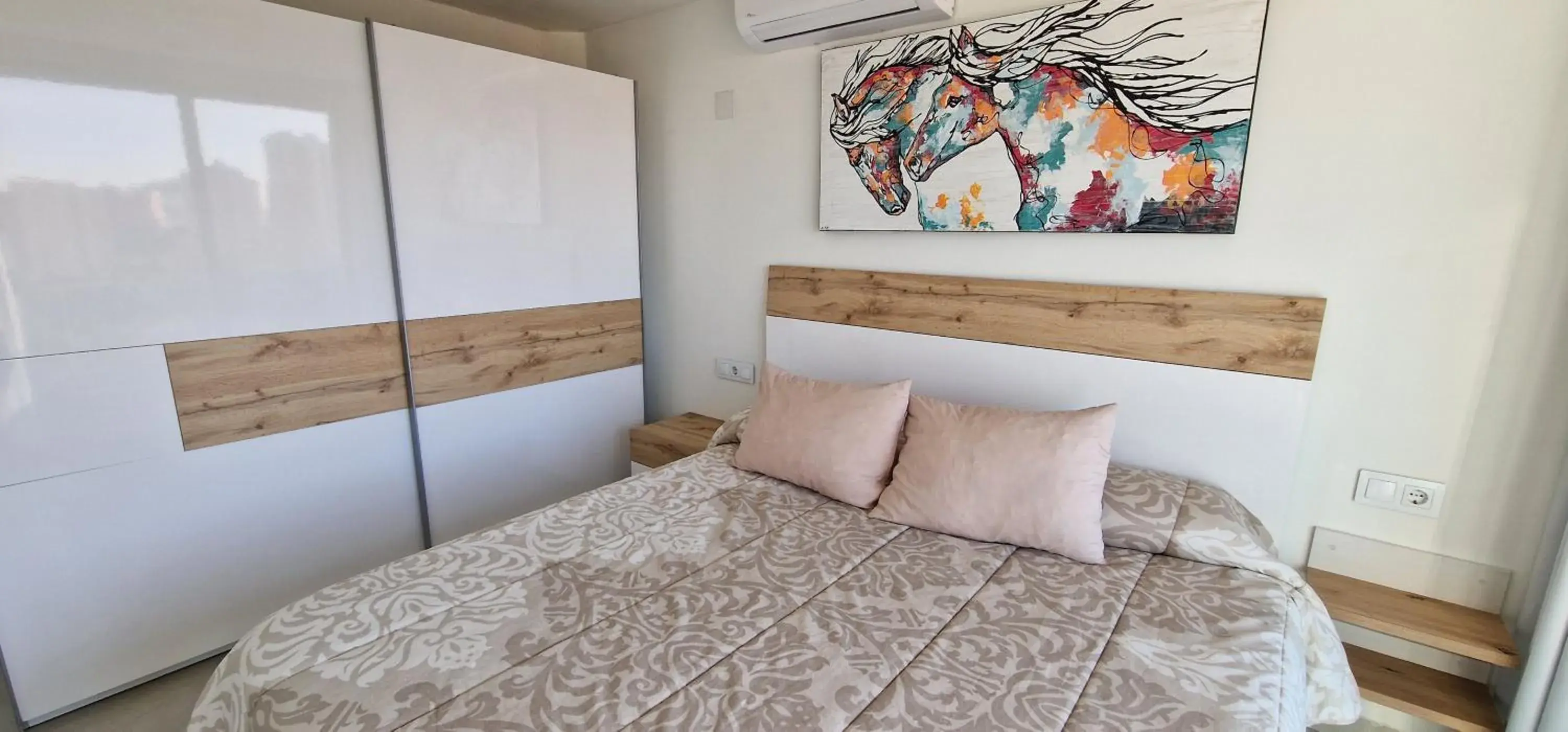 Bed in APARTAMENTOS OASIS DE LA CALA Bed in APARTAMENTOS OASIS DE LA CALA