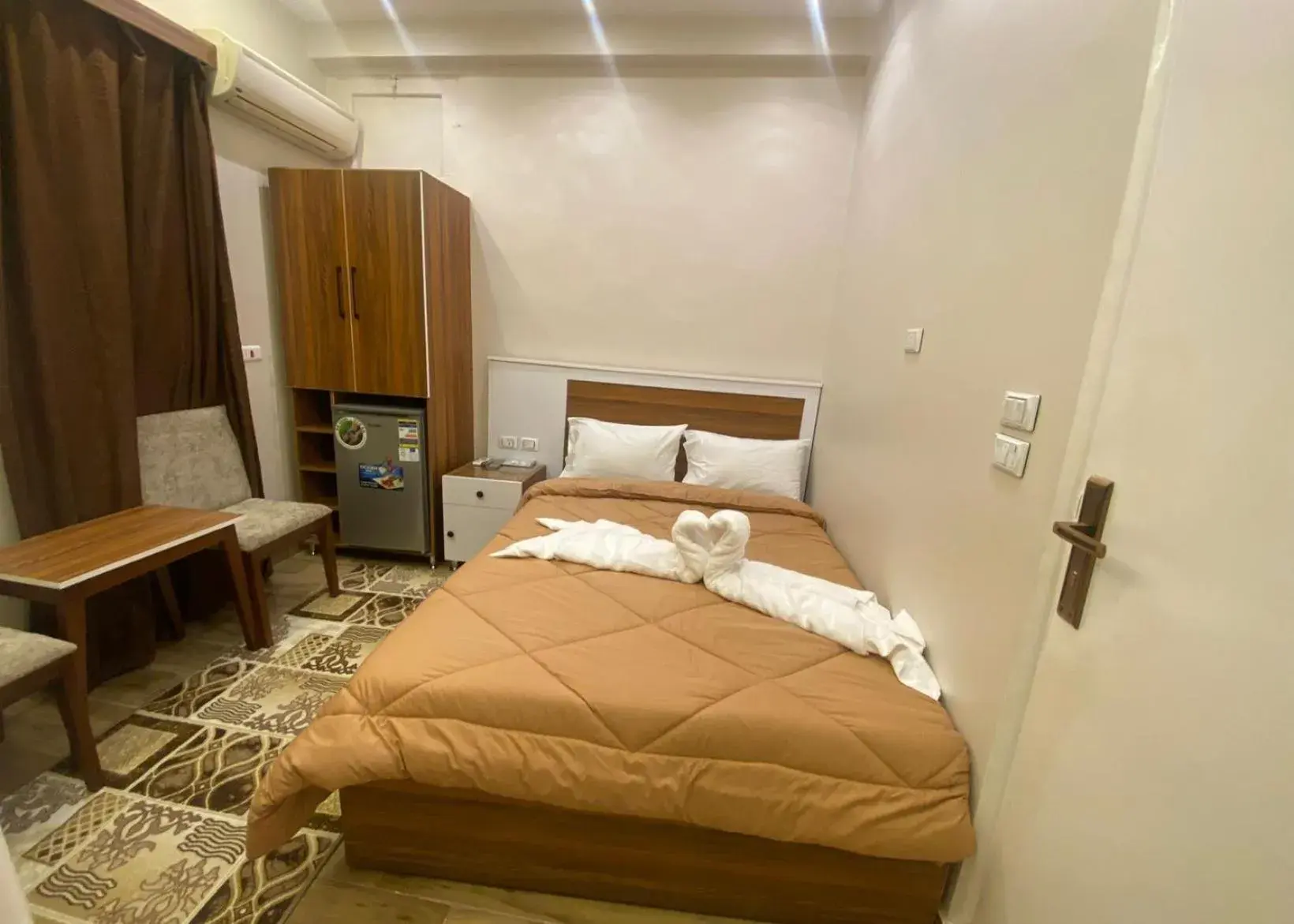 Bed in Central Cairo Hotel Bed in Central Cairo Hotel