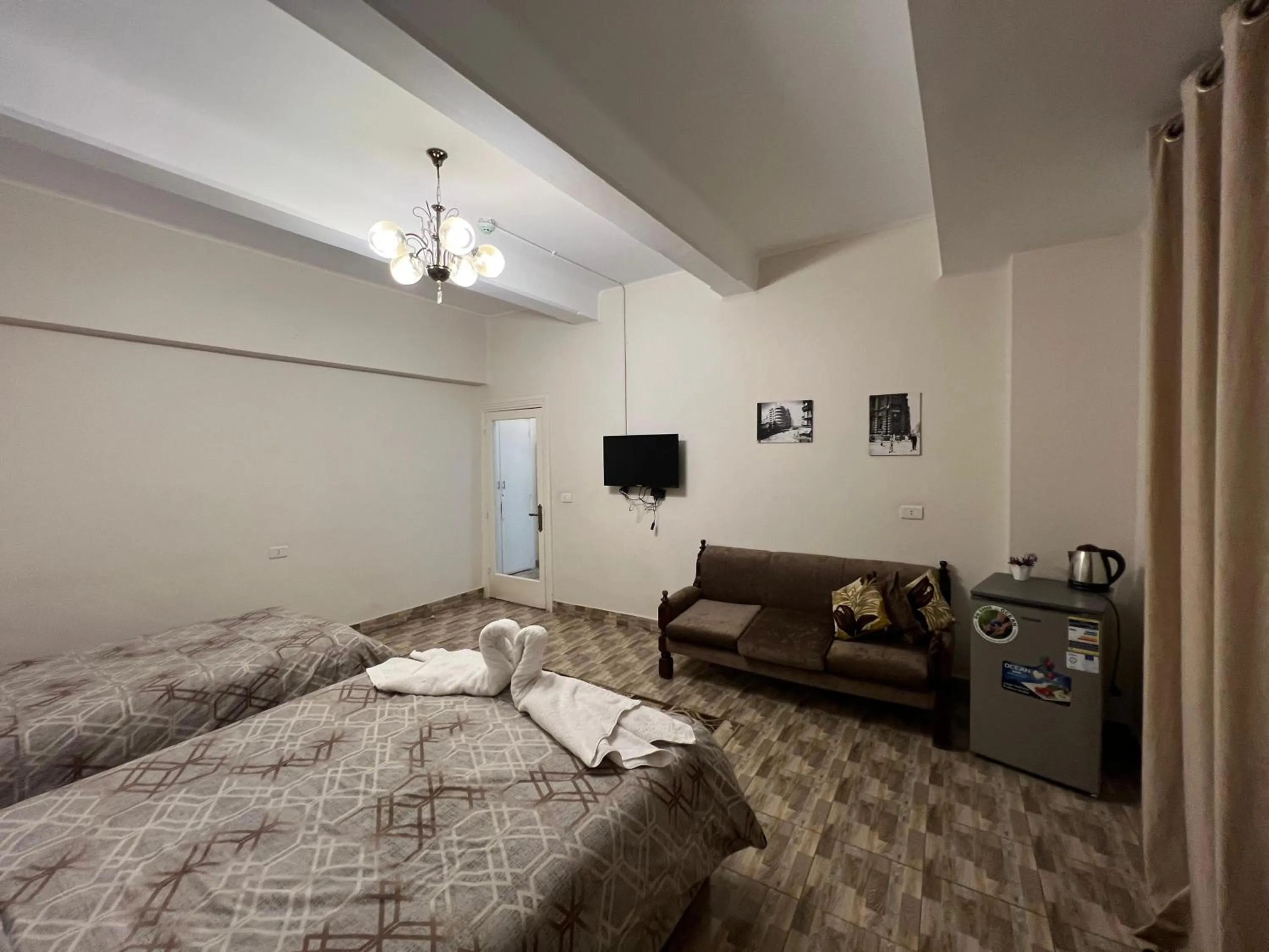 Photo of the whole room, Bed in Central Cairo Hotel