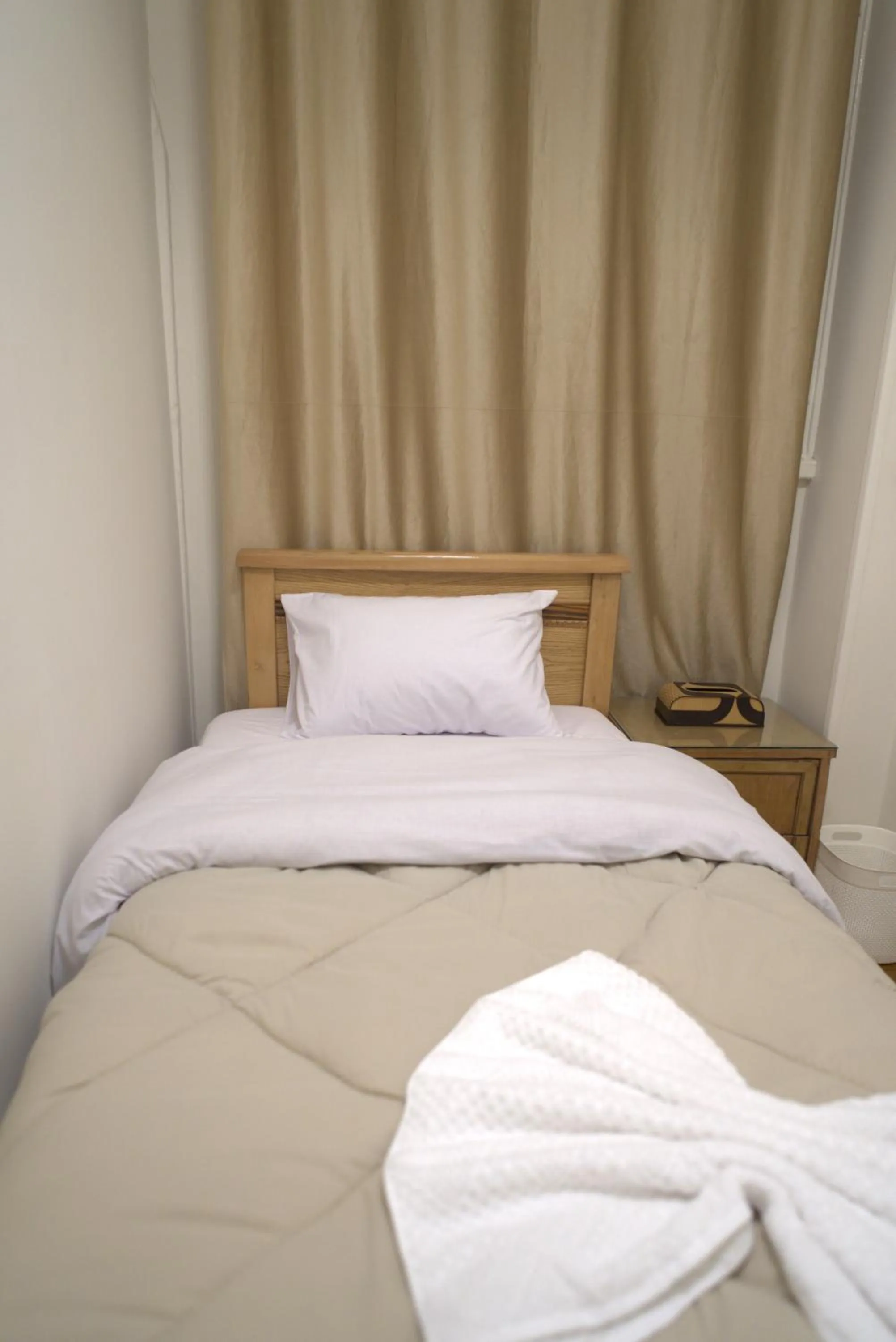 Bed in Central Cairo Hotel