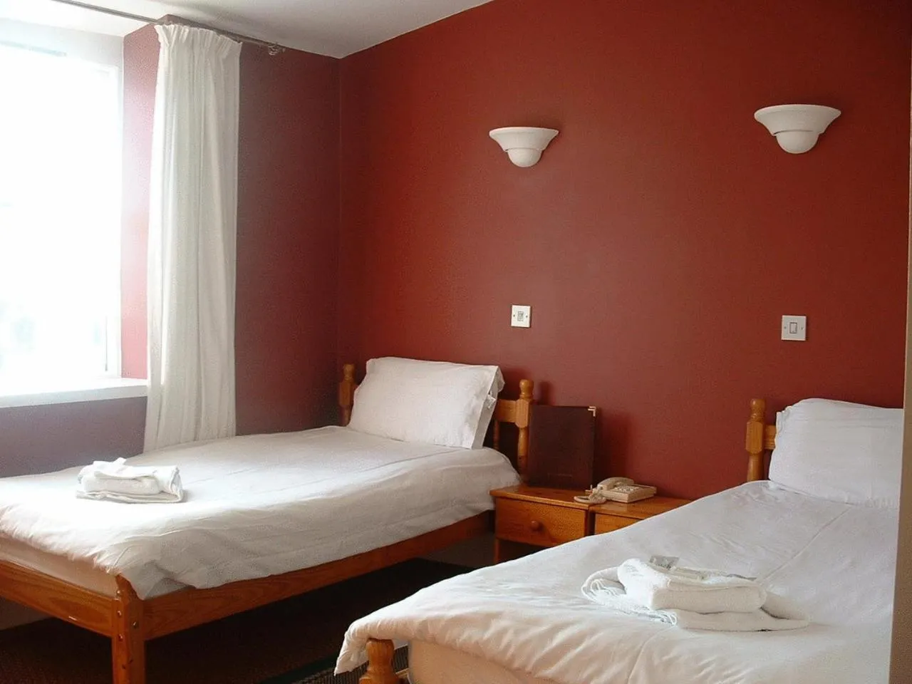 Bed in Bath House Hotel