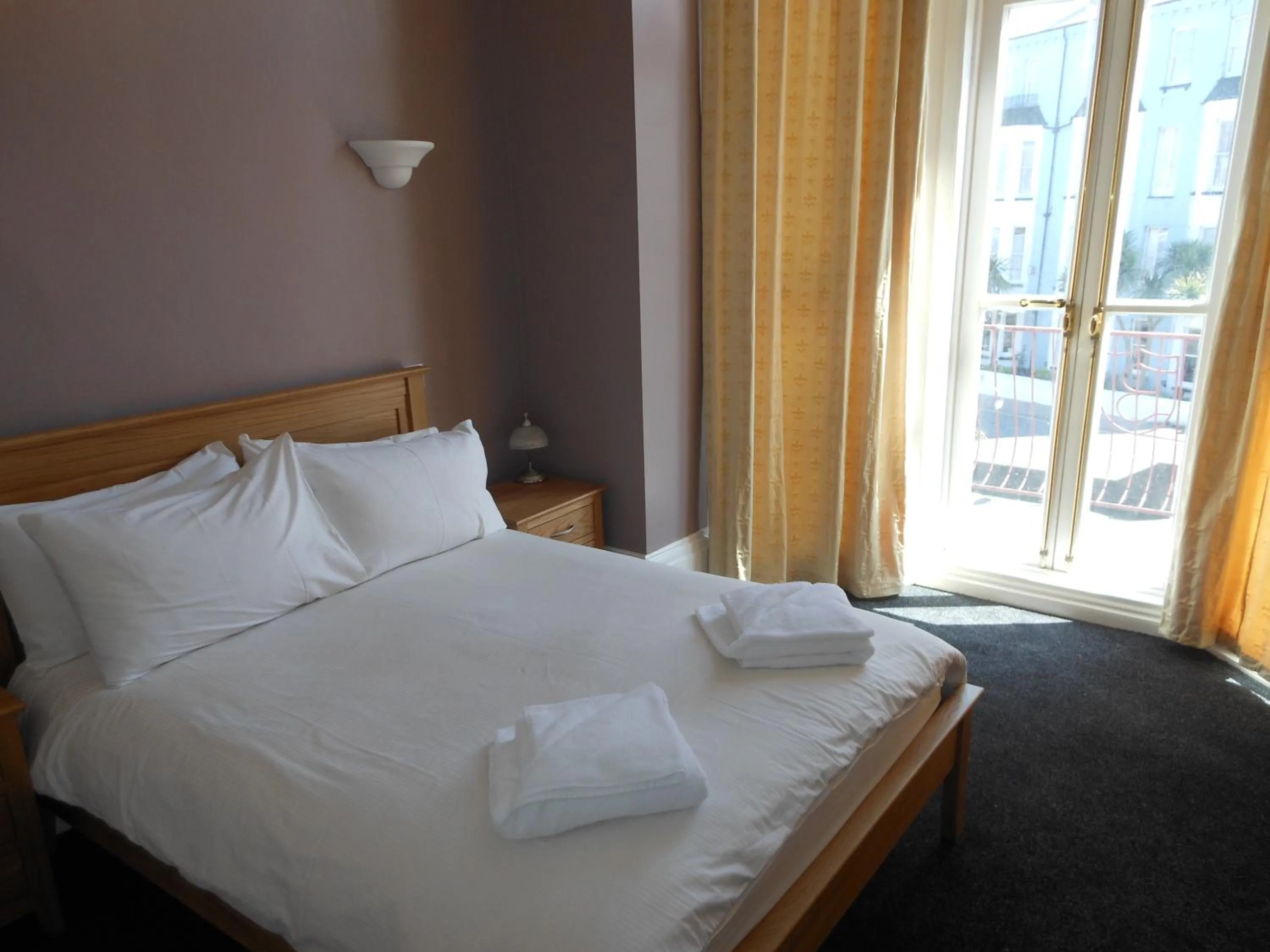 Bed in Bath House Hotel