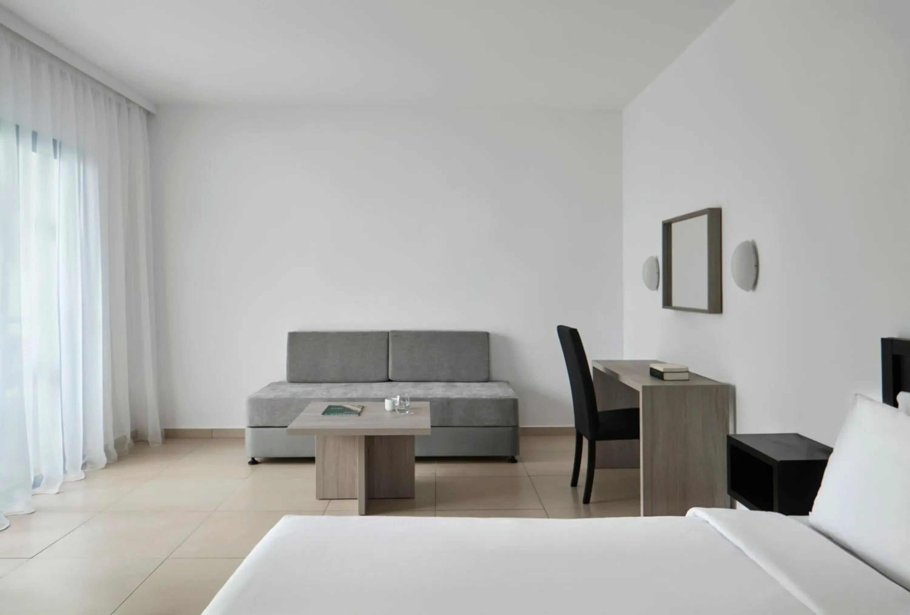 Living room, Bed in Atlantica Callisto Living room, Bed in Atlantica Callisto