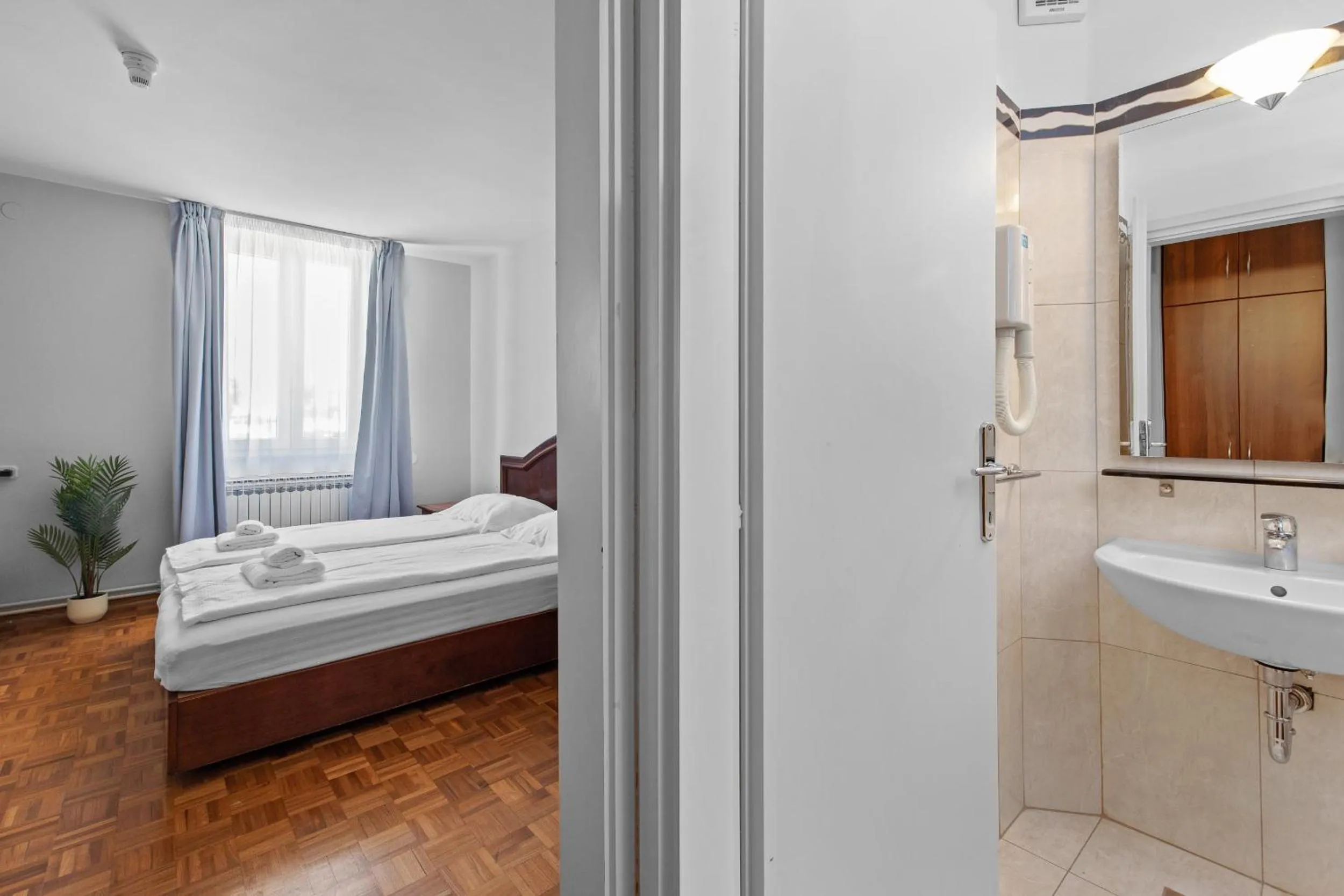 Bed in Minerva Hotel