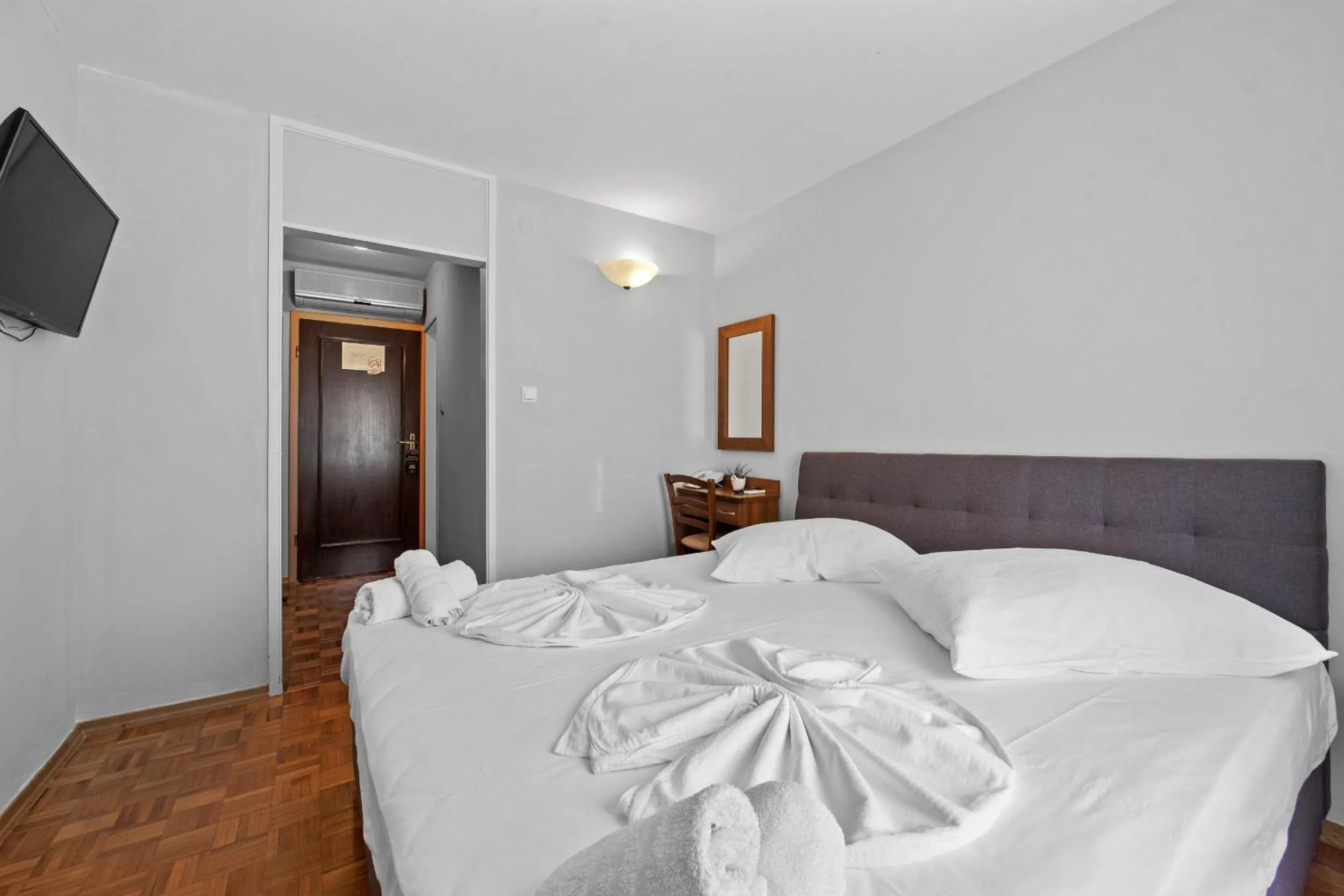 Bed in Minerva Hotel