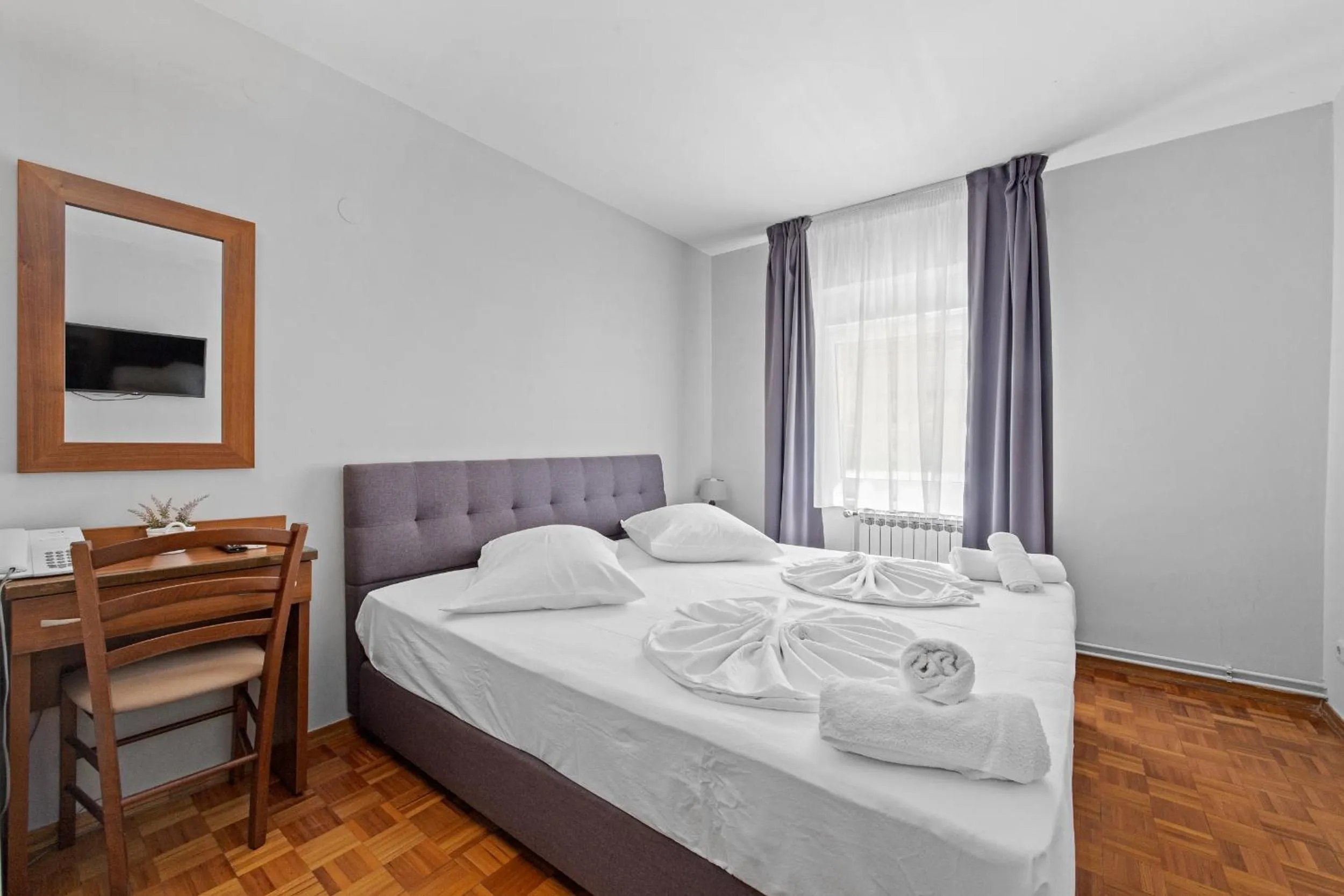 Bed in Minerva Hotel