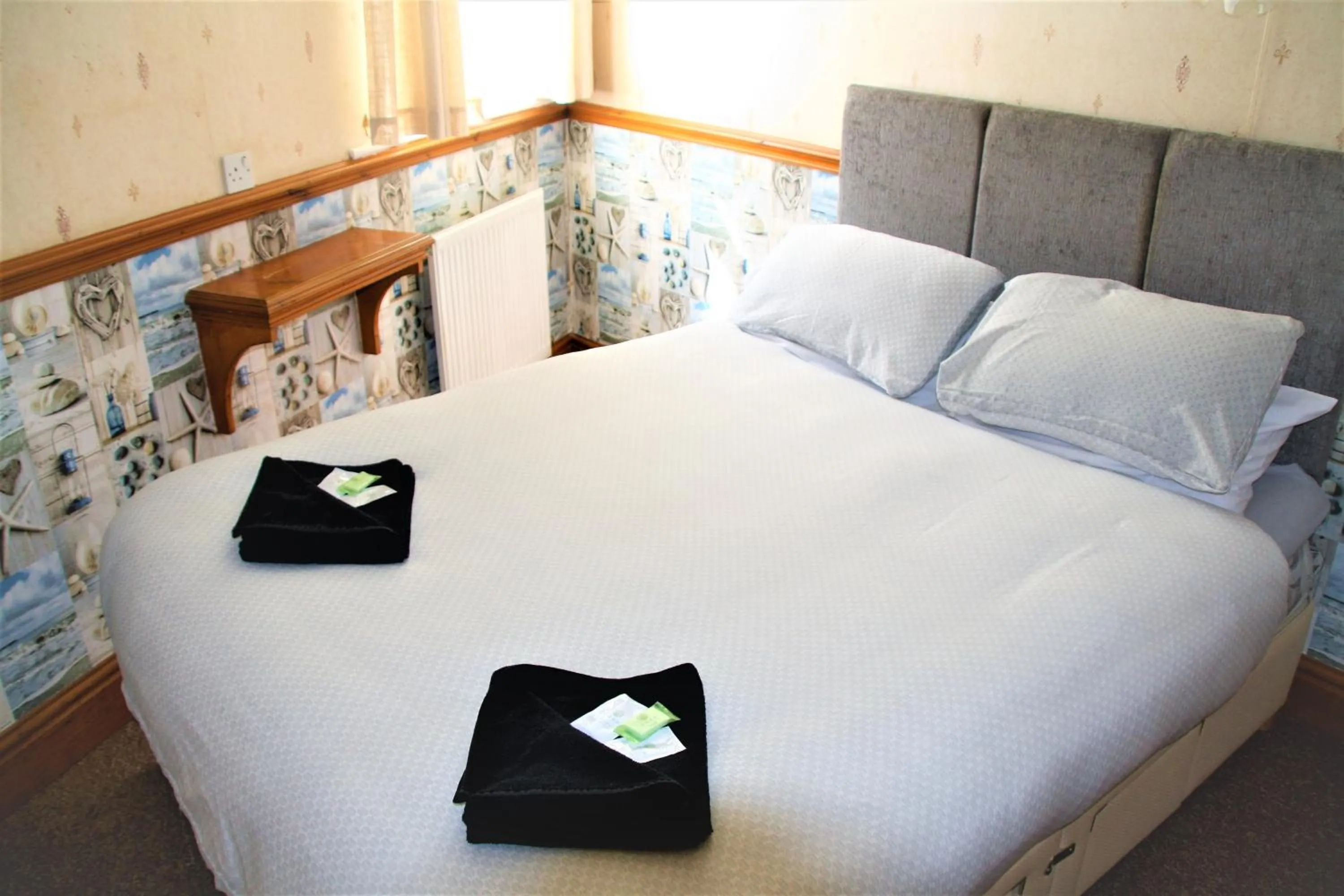 Bed in Pine Lodge Hotel