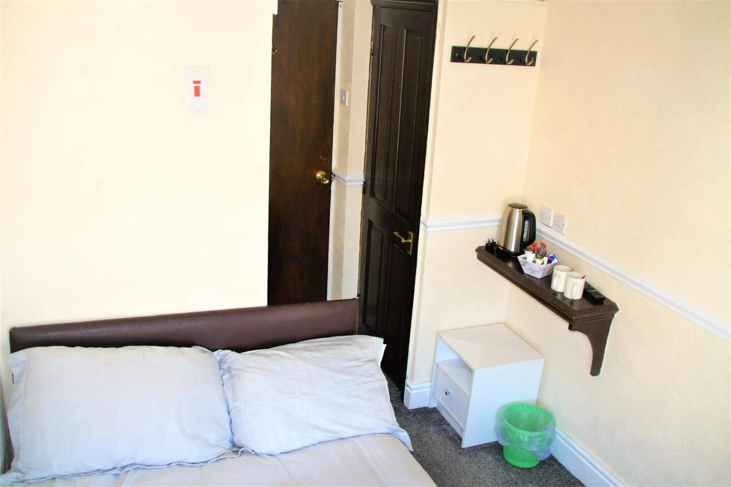 Bed in Pine Lodge Hotel