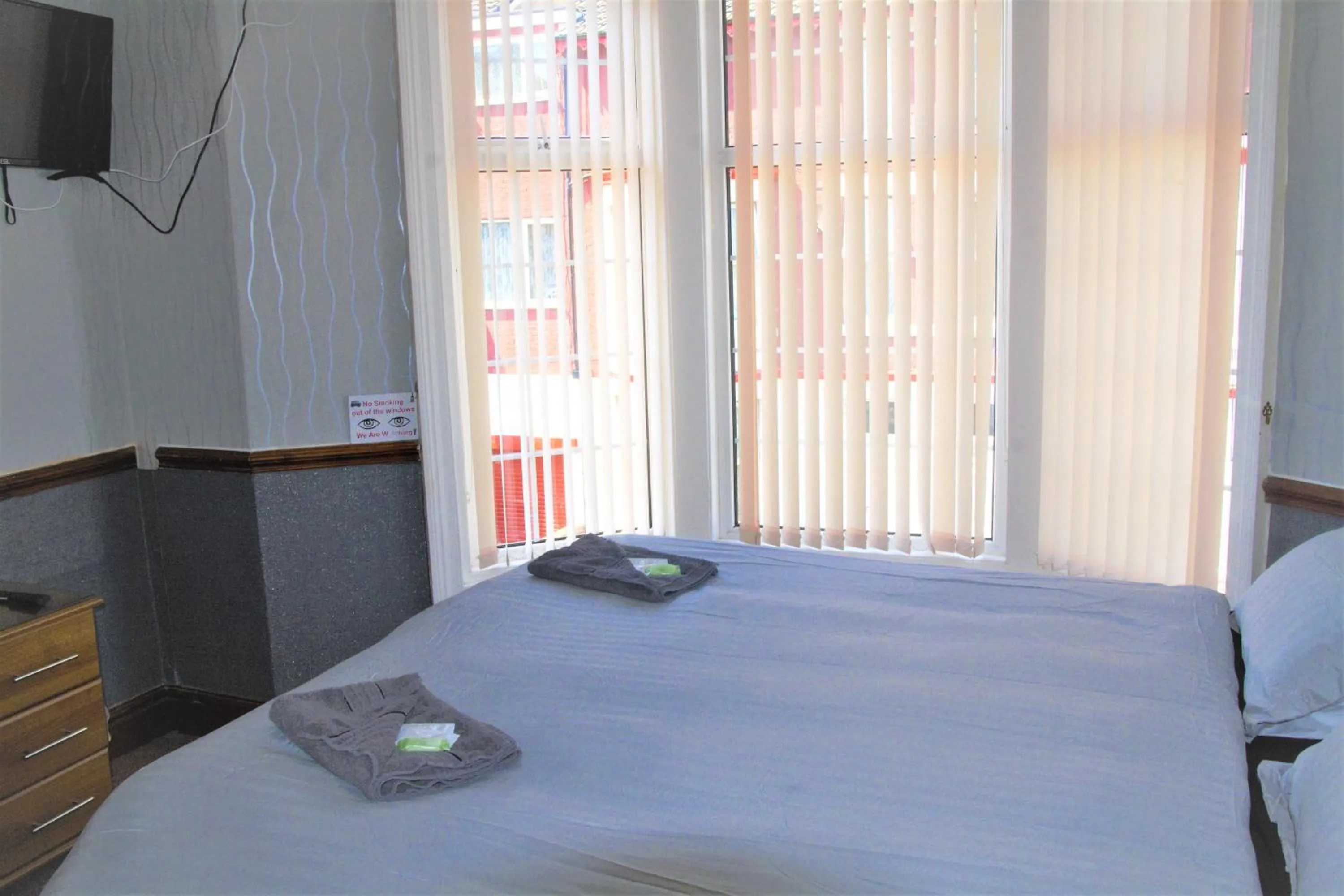 Bed in Pine Lodge Hotel