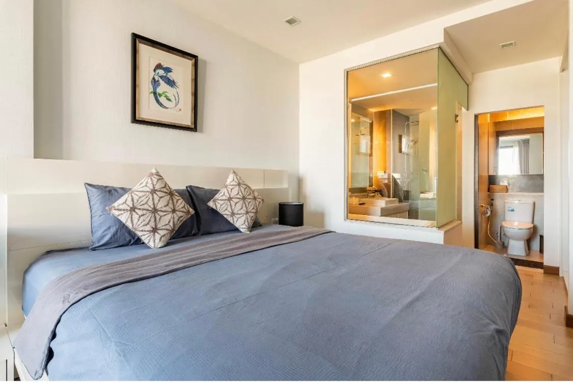 Bed in The Astra Chiang Mai Luxury Condo