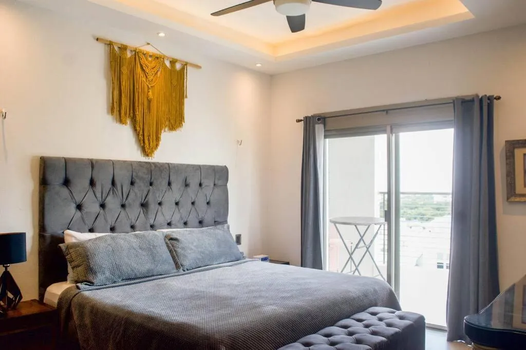 Bed in Hermoso Penthouse Rooftop con alberca