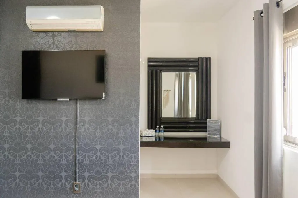 TV and multimedia in Hermoso Penthouse Rooftop con alberca