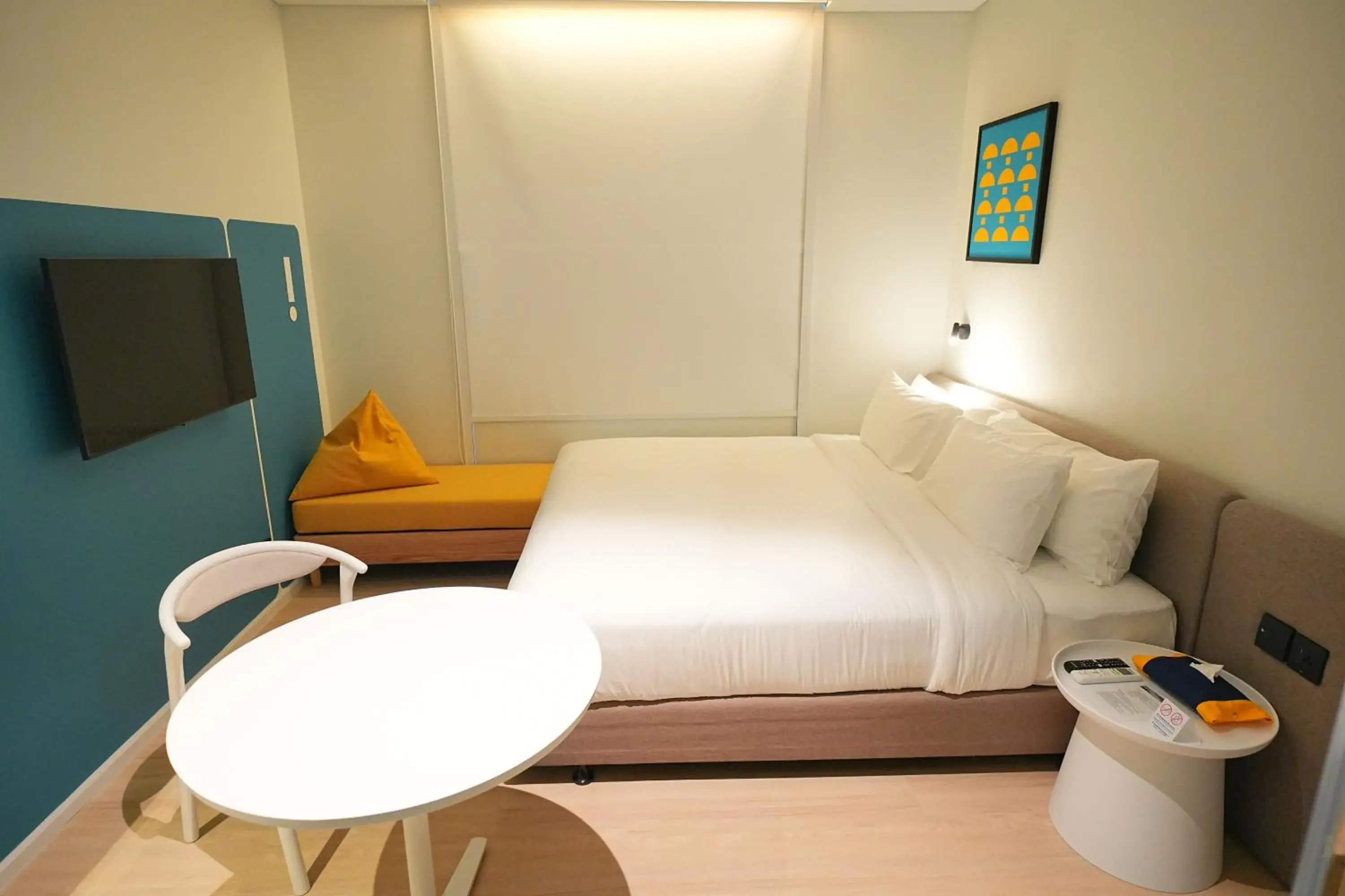 Communal lounge/ TV room, Bed in GO Hotel Si Racha at Central Si Racha Communal lounge/ TV room, Bed in GO Hotel Si Racha at Central Si Racha