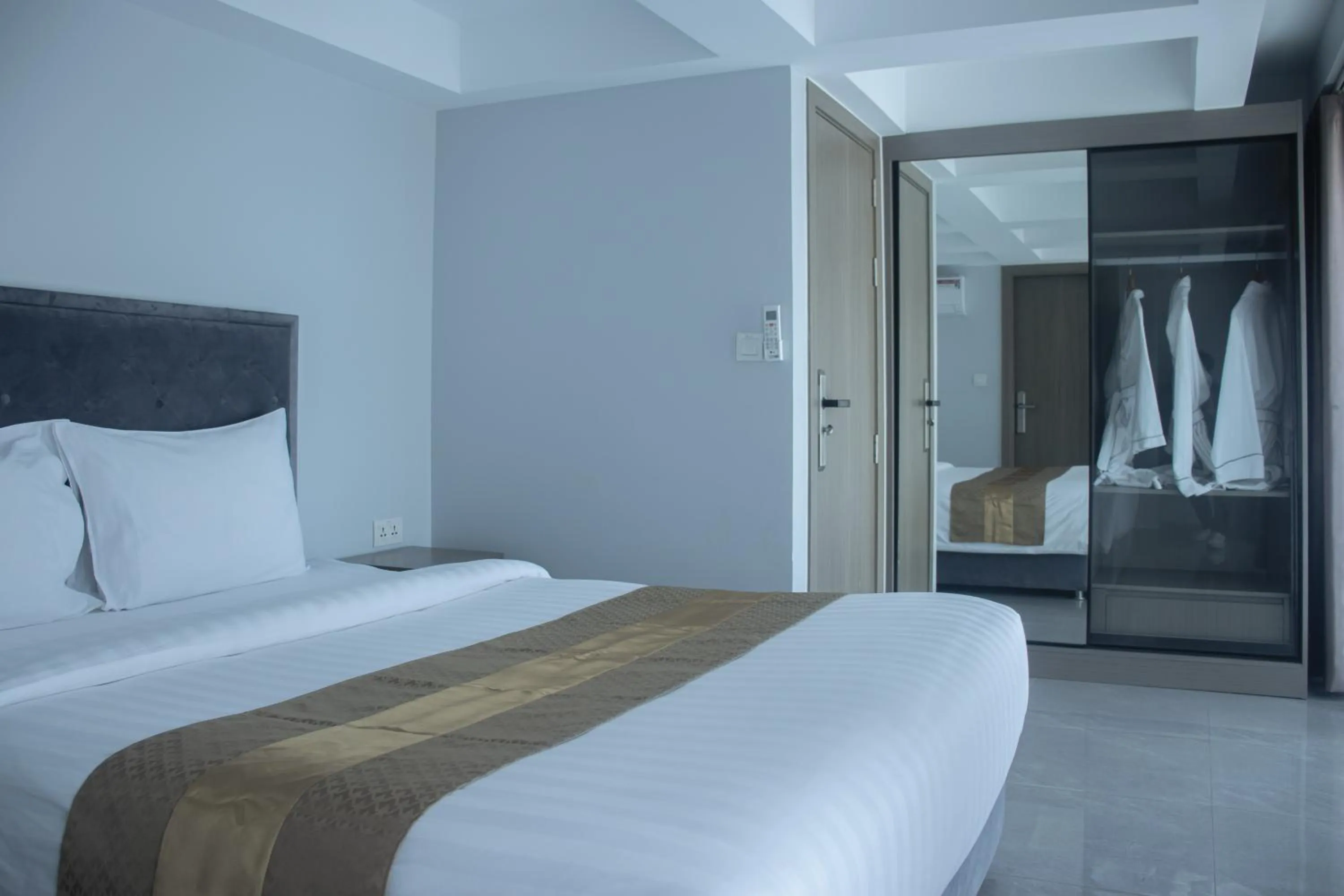 Bed in Parc21 Luxury Boutique Hotel