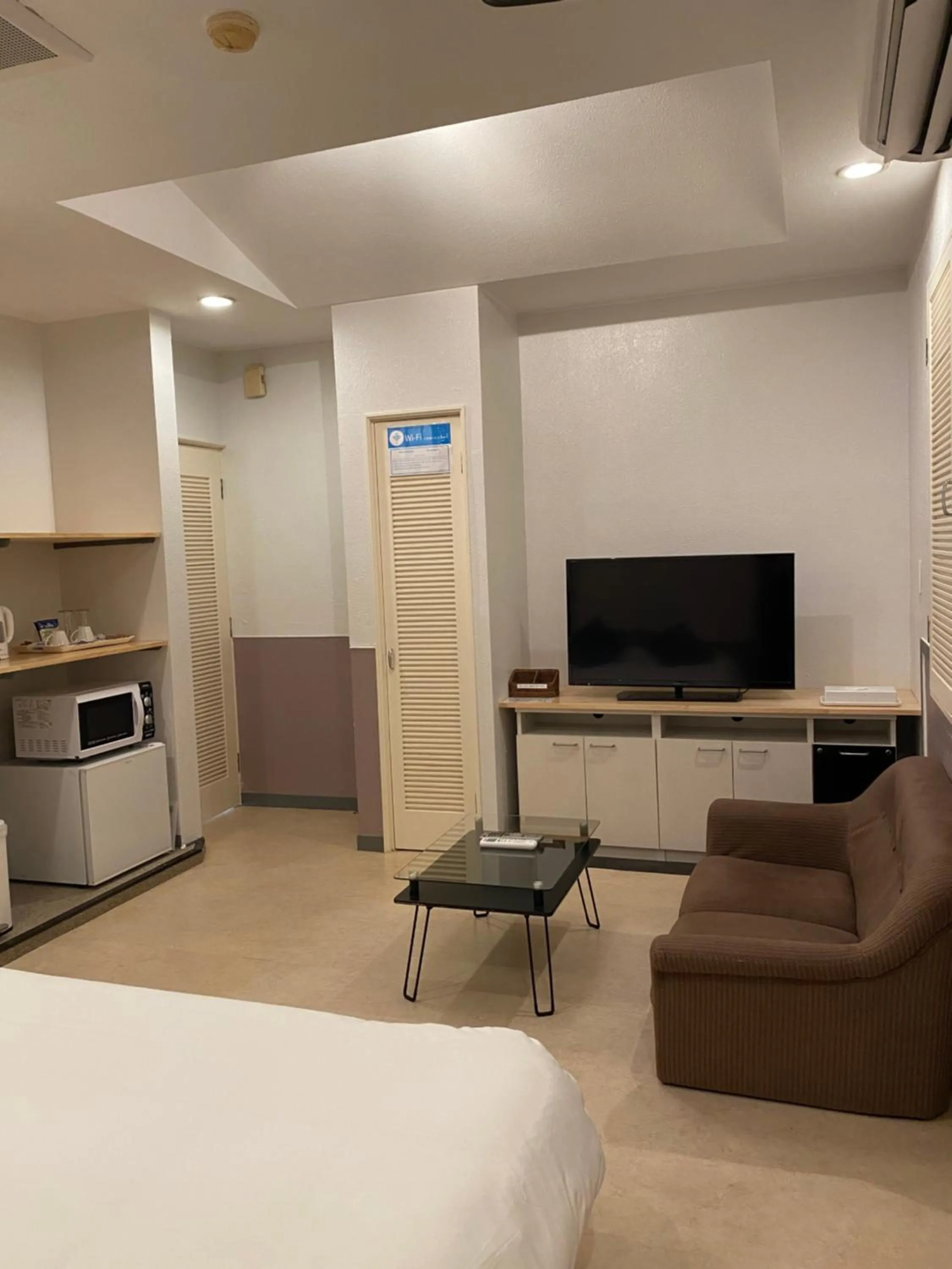 Bed in Hotel Takao Asile