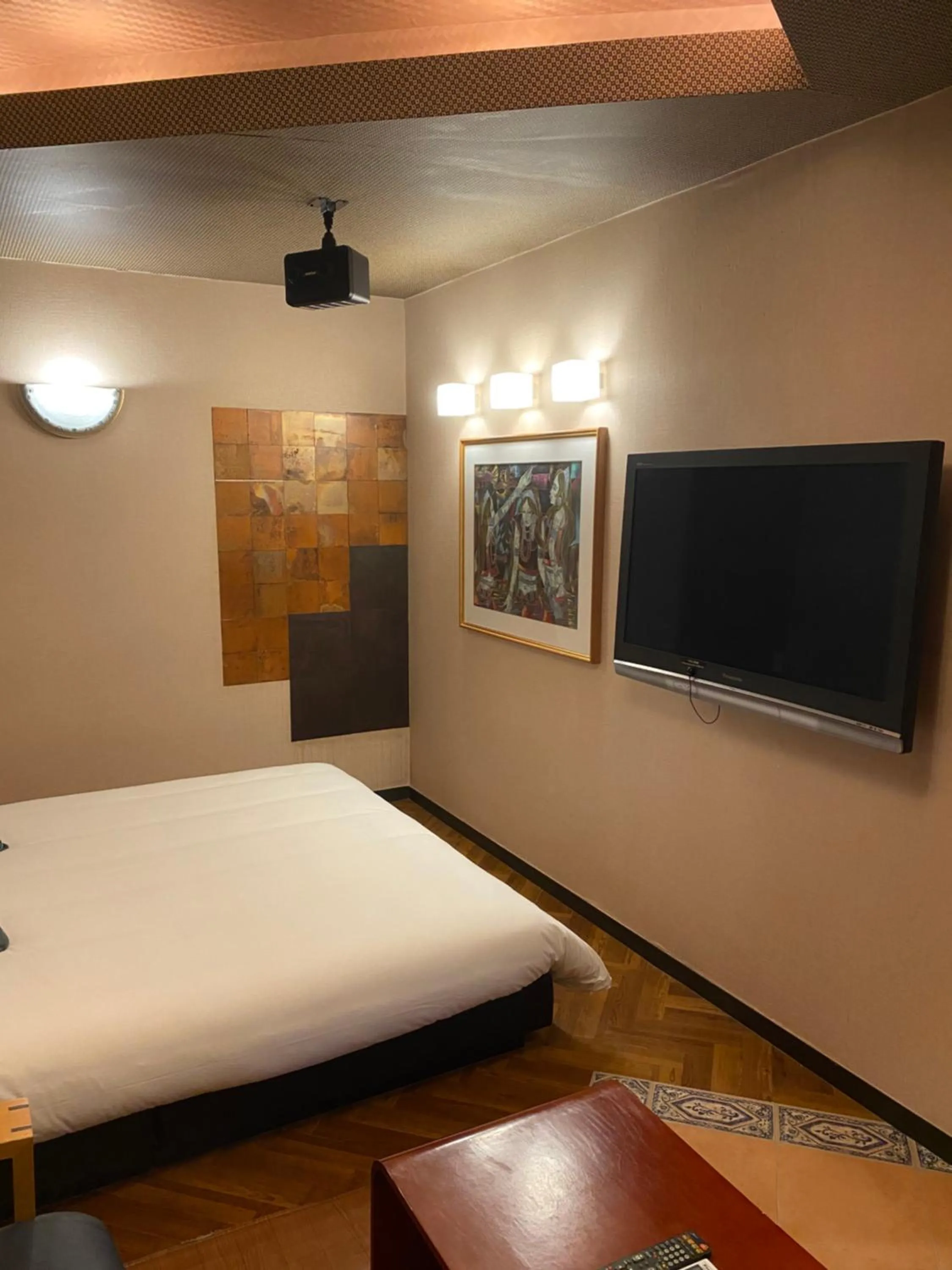 Bed in Hotel Takao Asile