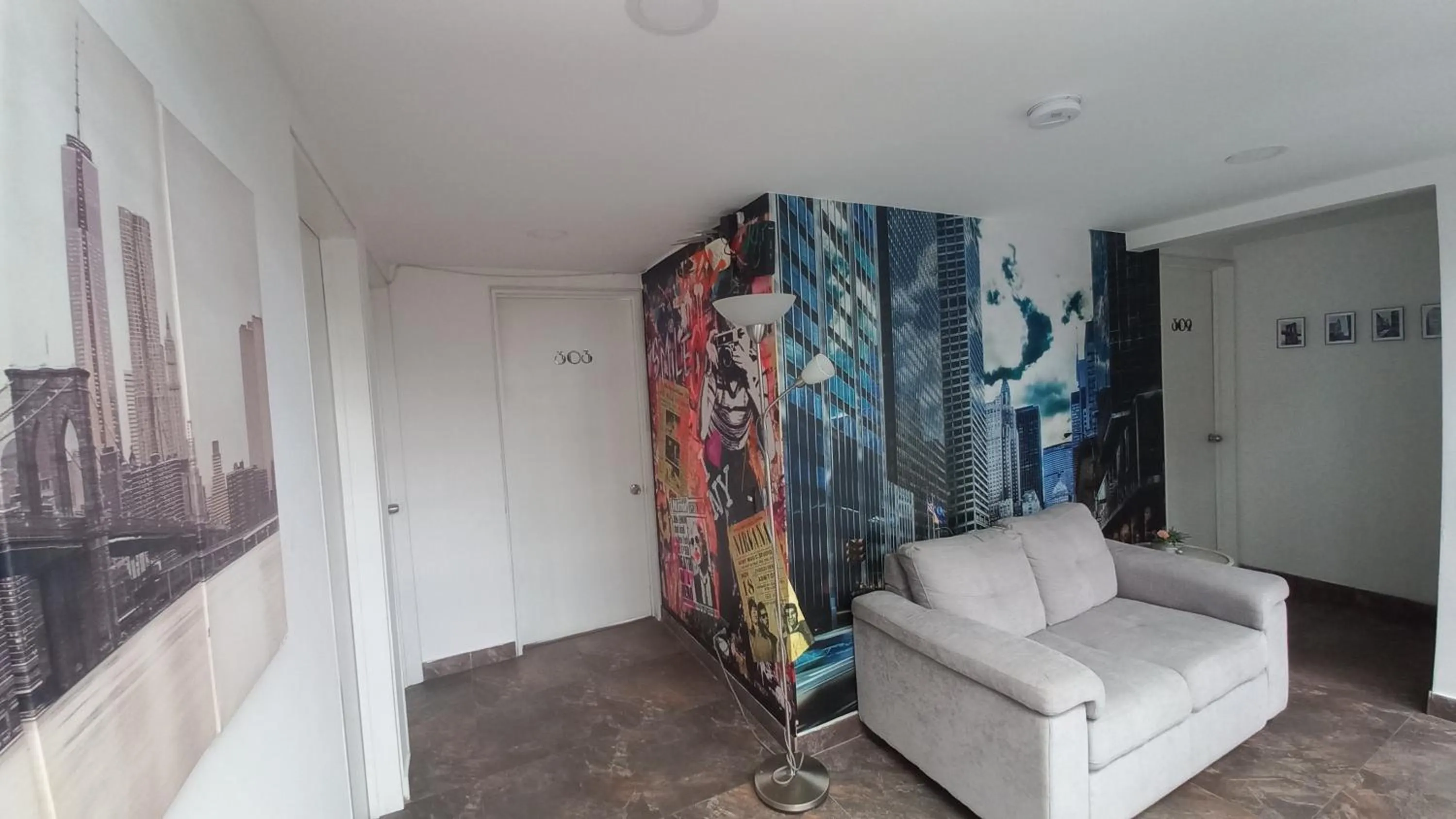 Living room, Bed in Alojamiento Mosaic House