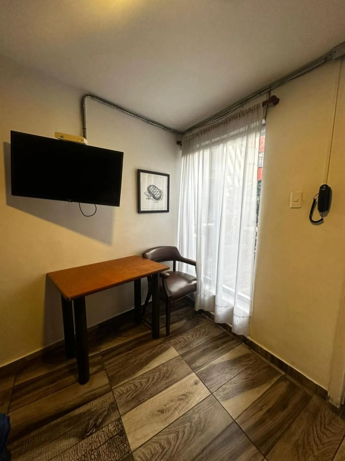 Photo of the whole room in Alojamiento Mosaic House