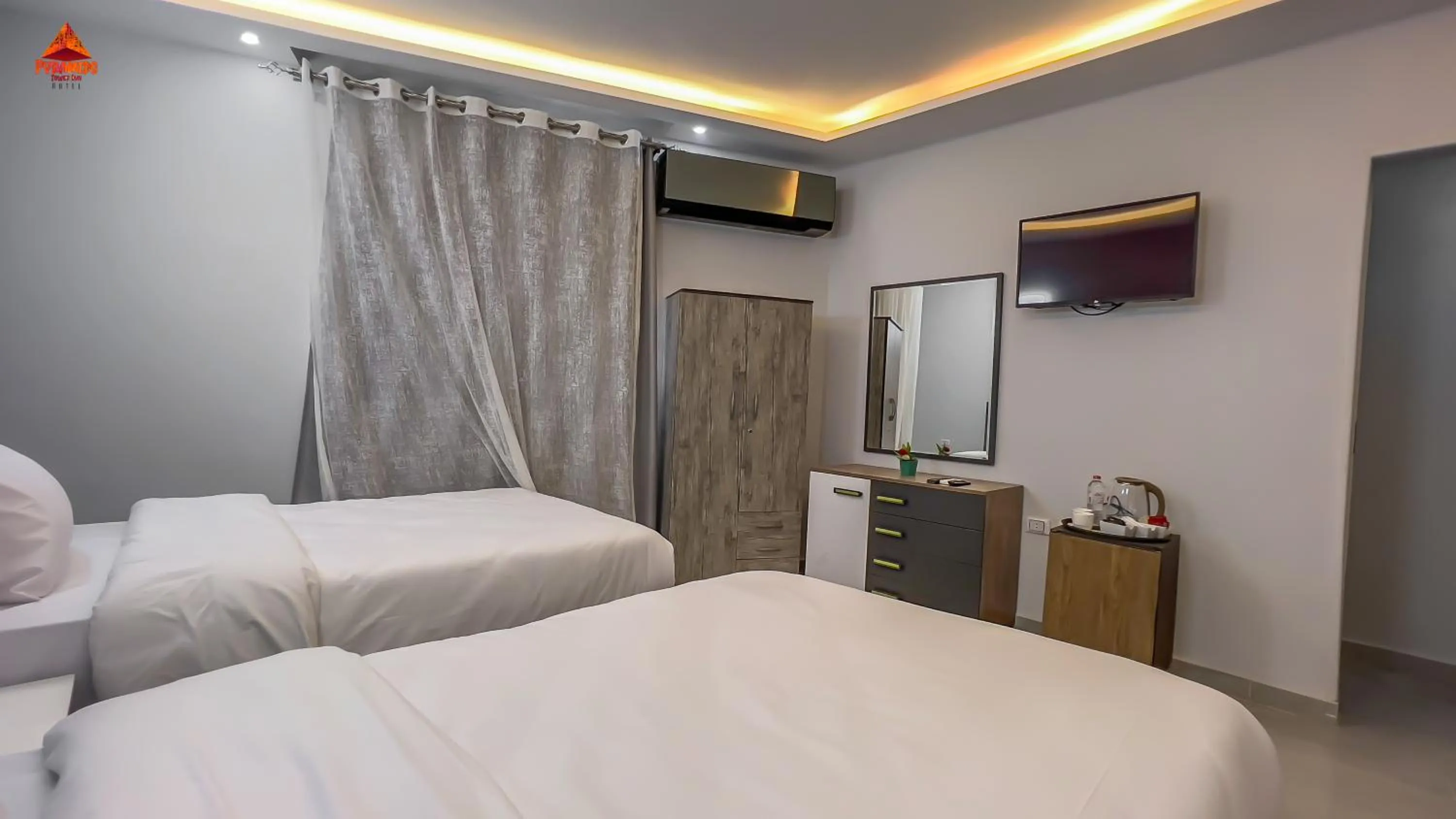 Bed in pyramids tower view inn