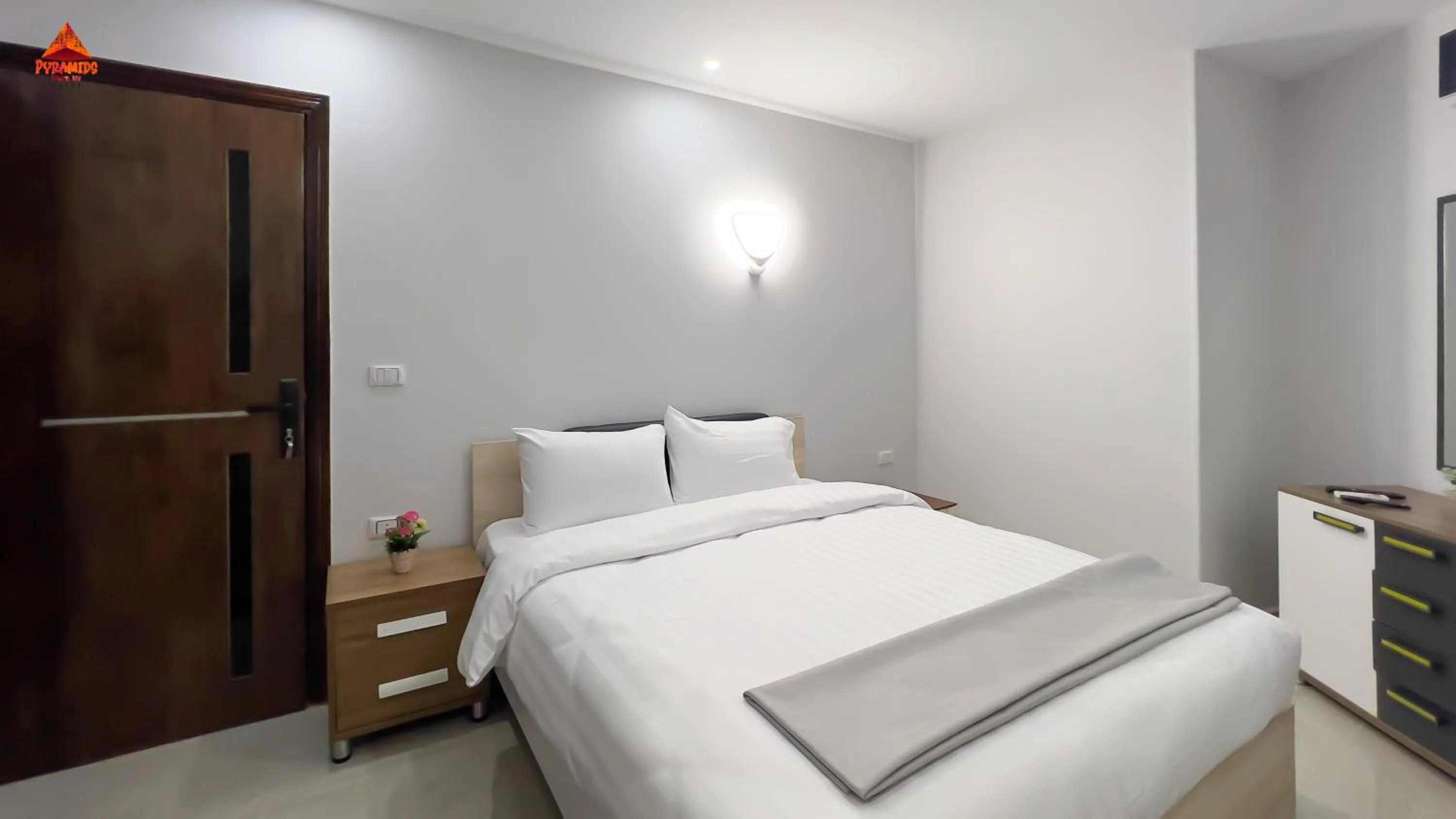 Bed in pyramids tower view inn