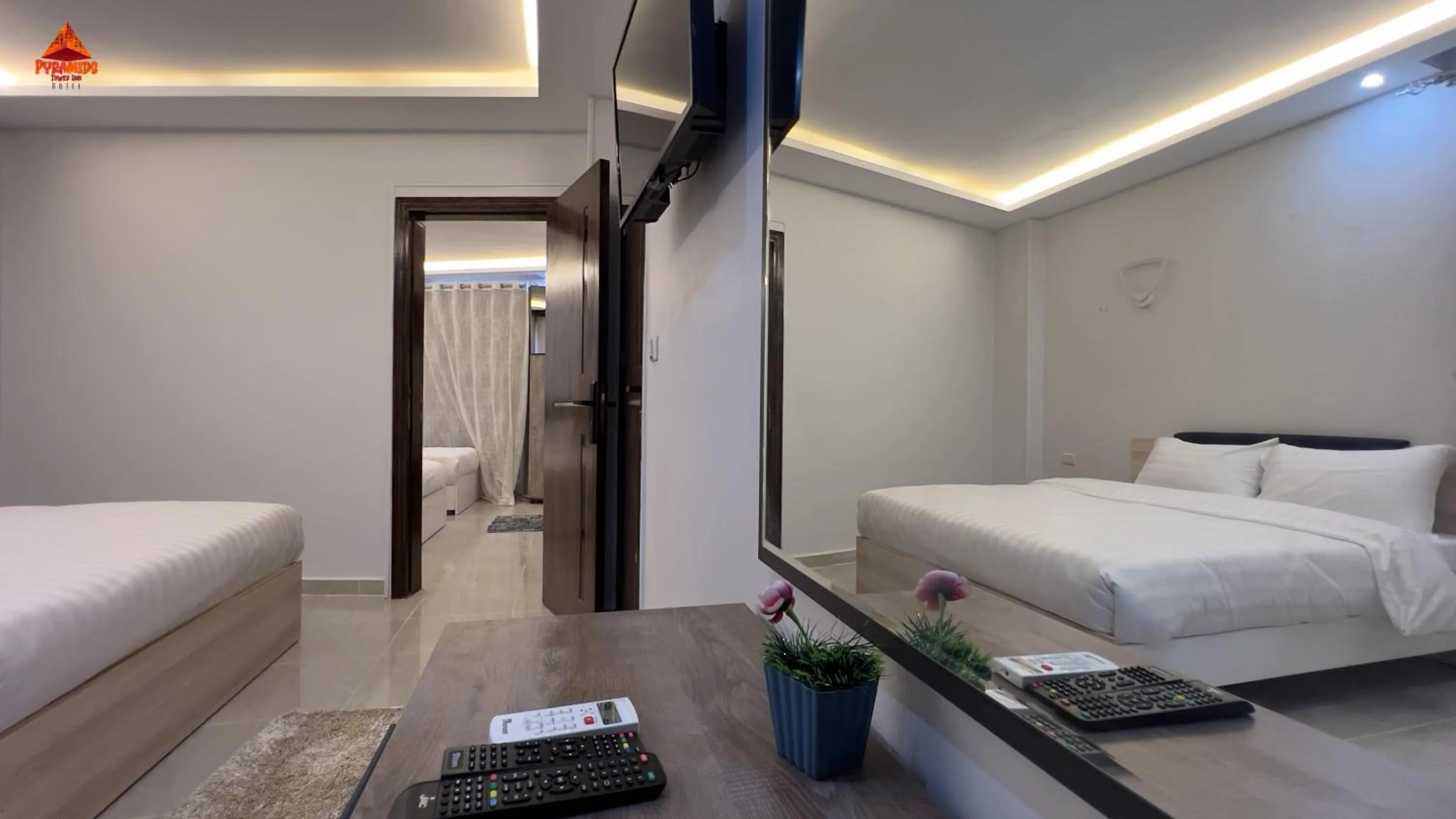 Bed in pyramids tower view inn